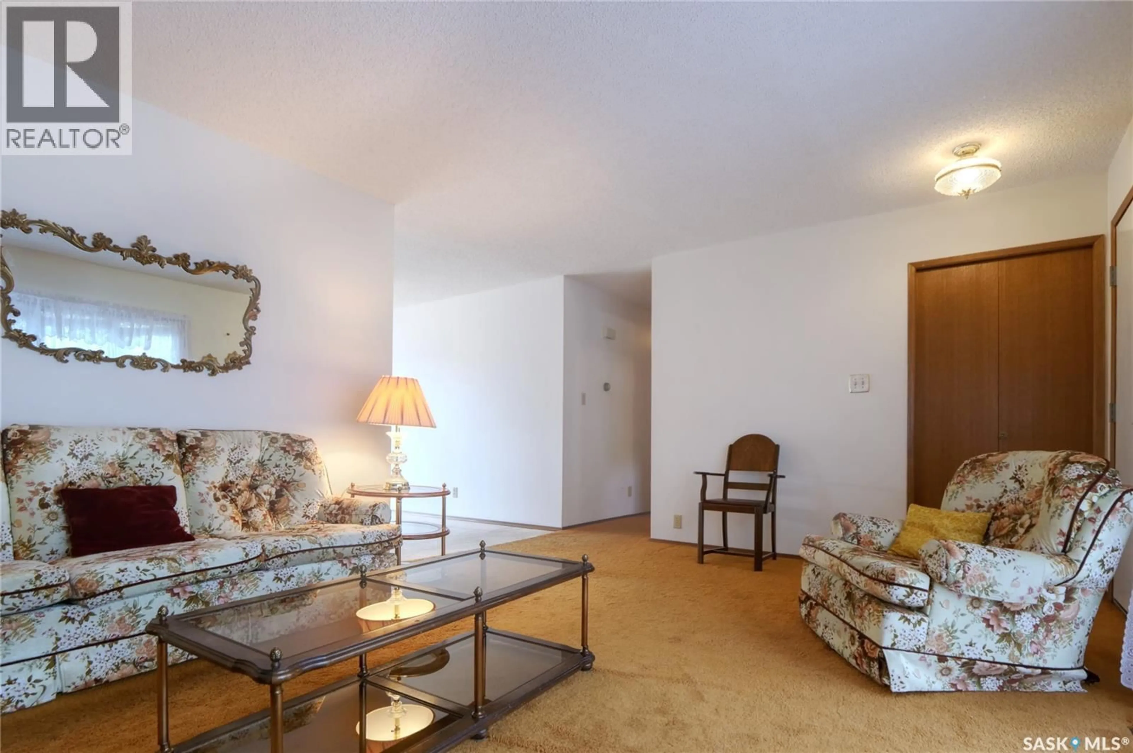 Living room with furniture, unknown for 1008 PARKLANE DRIVE, Assiniboia Saskatchewan S0H0B0