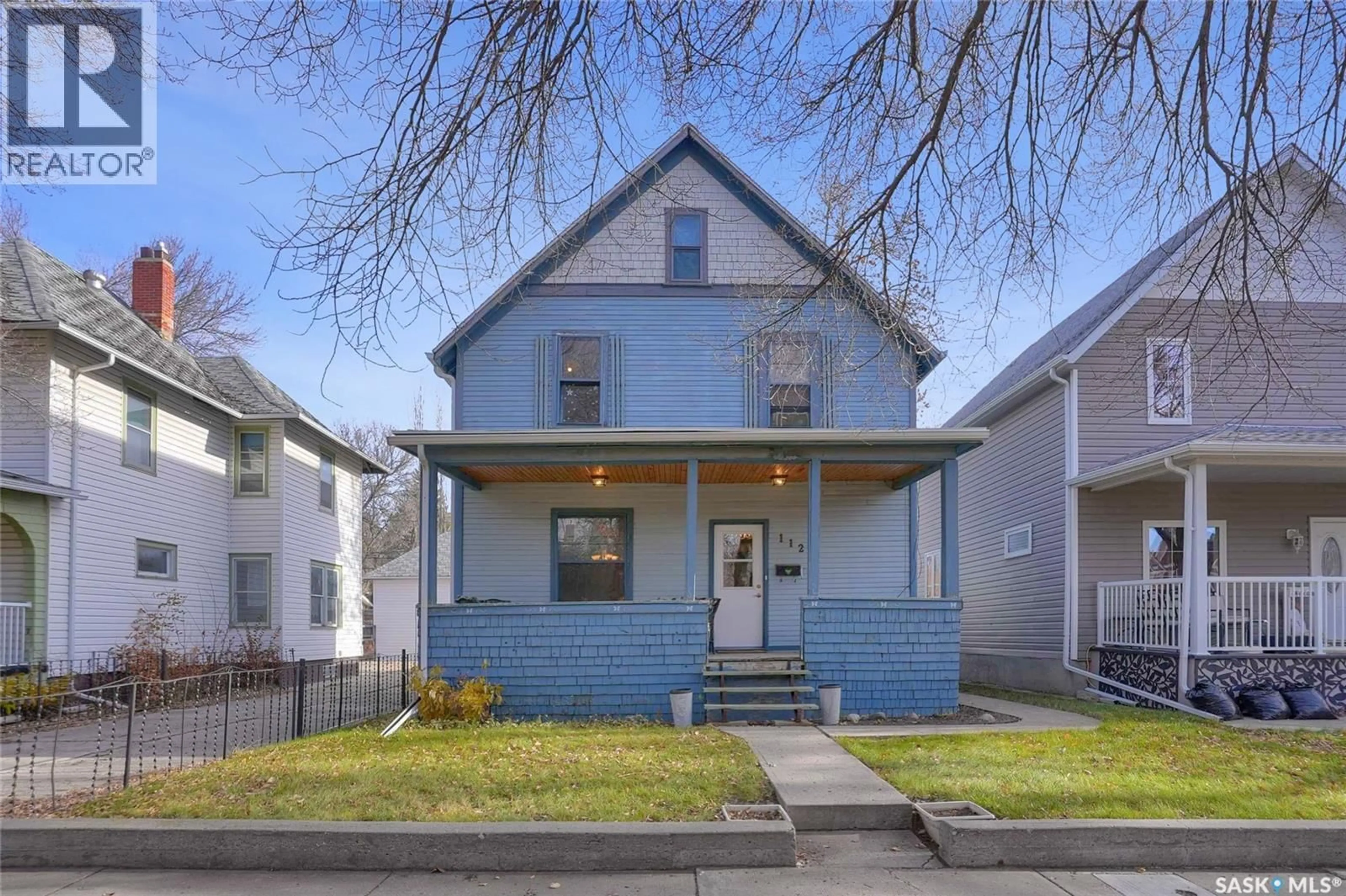 Home with vinyl exterior material, street for 1127 2ND AVENUE, Moose Jaw Saskatchewan S6H3R4