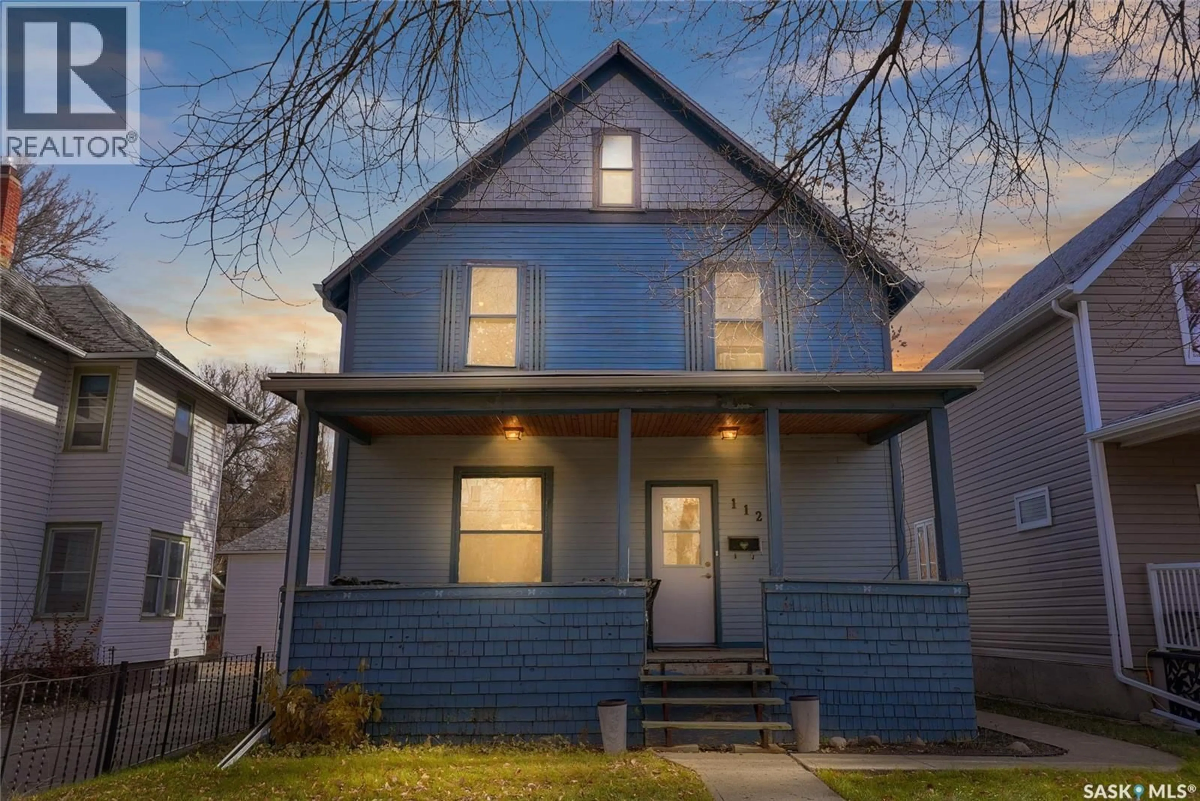 Home with vinyl exterior material, street for 1127 2ND AVENUE, Moose Jaw Saskatchewan S6H3R4