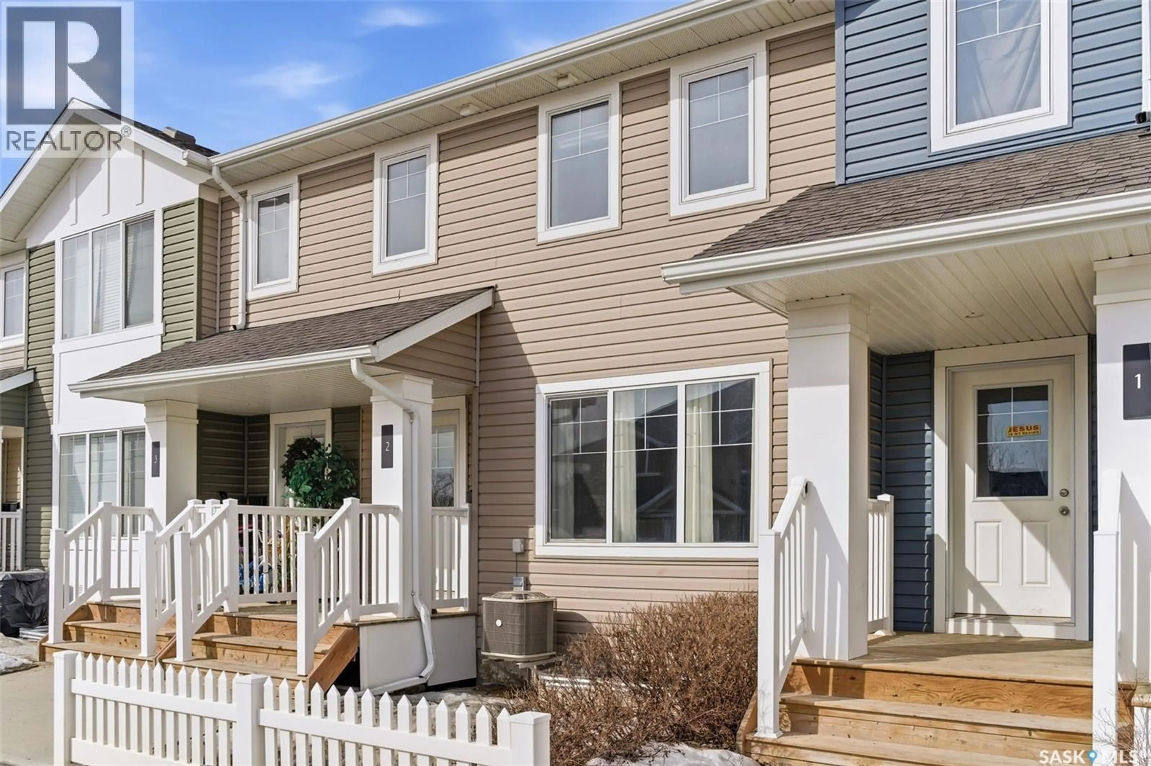 Home with vinyl exterior material, street for 2 - 5752 GORDON ROAD, Regina Saskatchewan S4W0M1