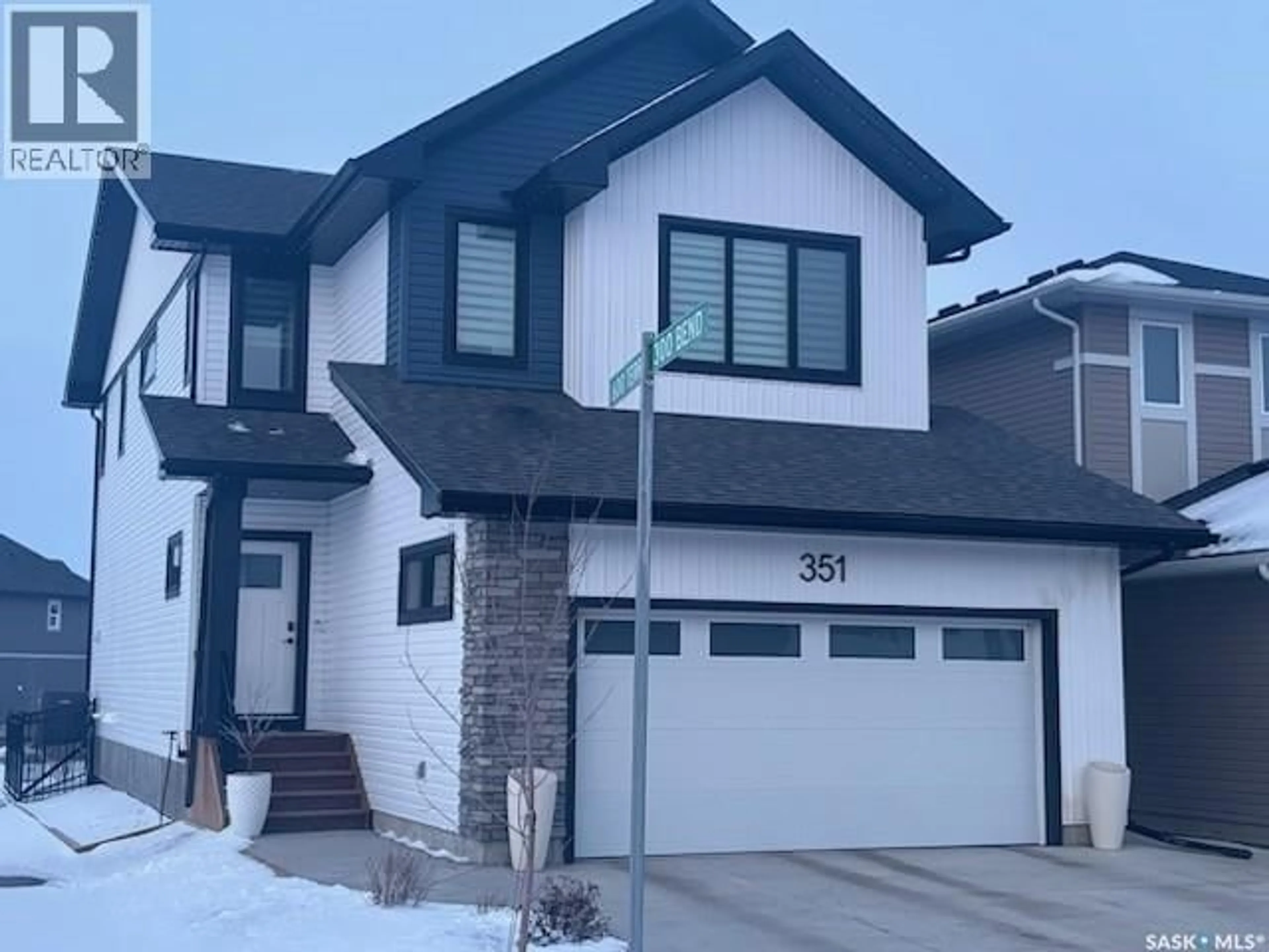 Home with vinyl exterior material, street for 351 ANISKOTAW BEND, Saskatoon Saskatchewan S7V1M1
