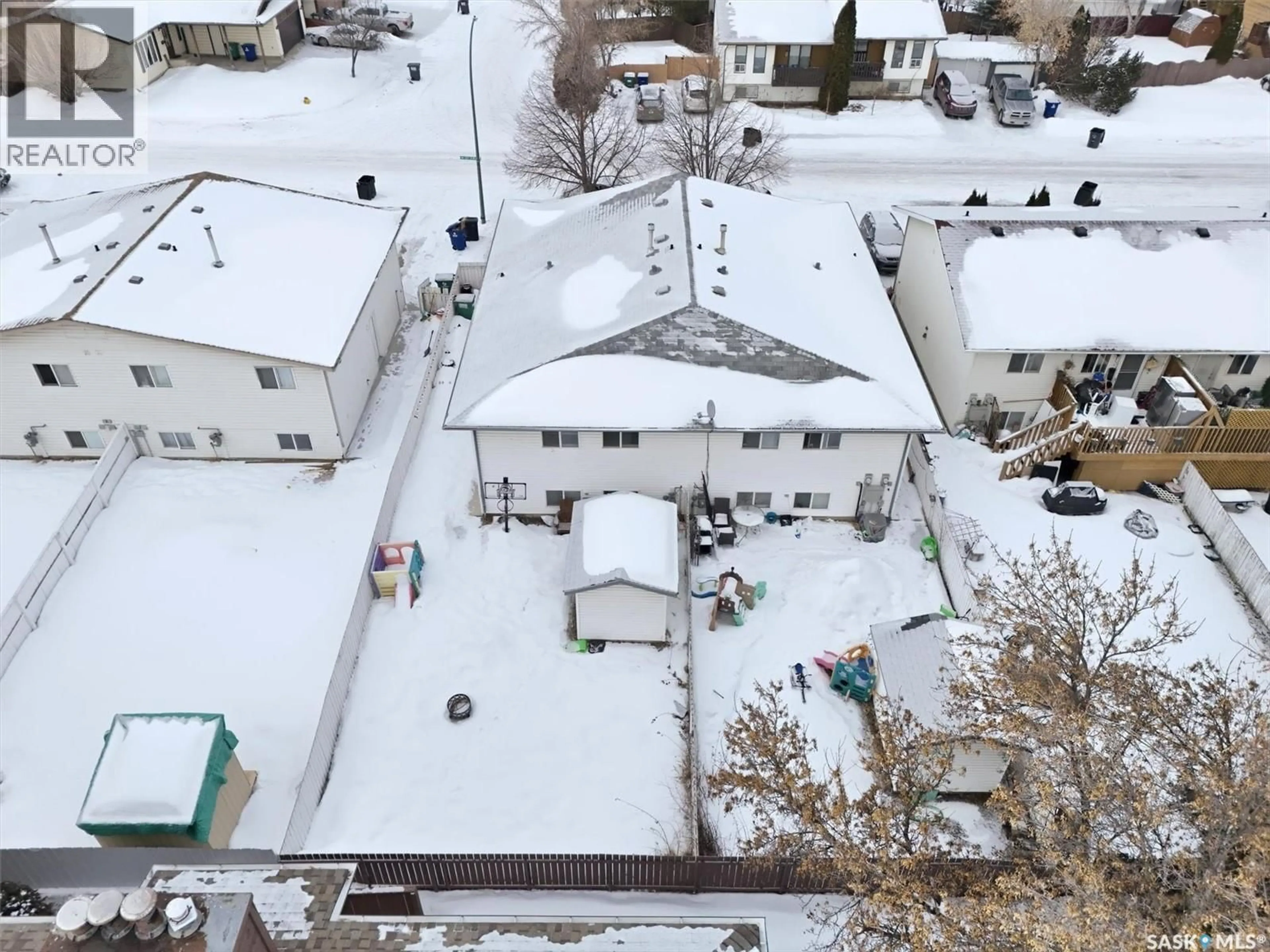 A pic from outside/outdoor area/front of a property/back of a property/a pic from drone, unknown for 114 - 116 BARBER CRESCENT, Saskatoon Saskatchewan S7M5M7