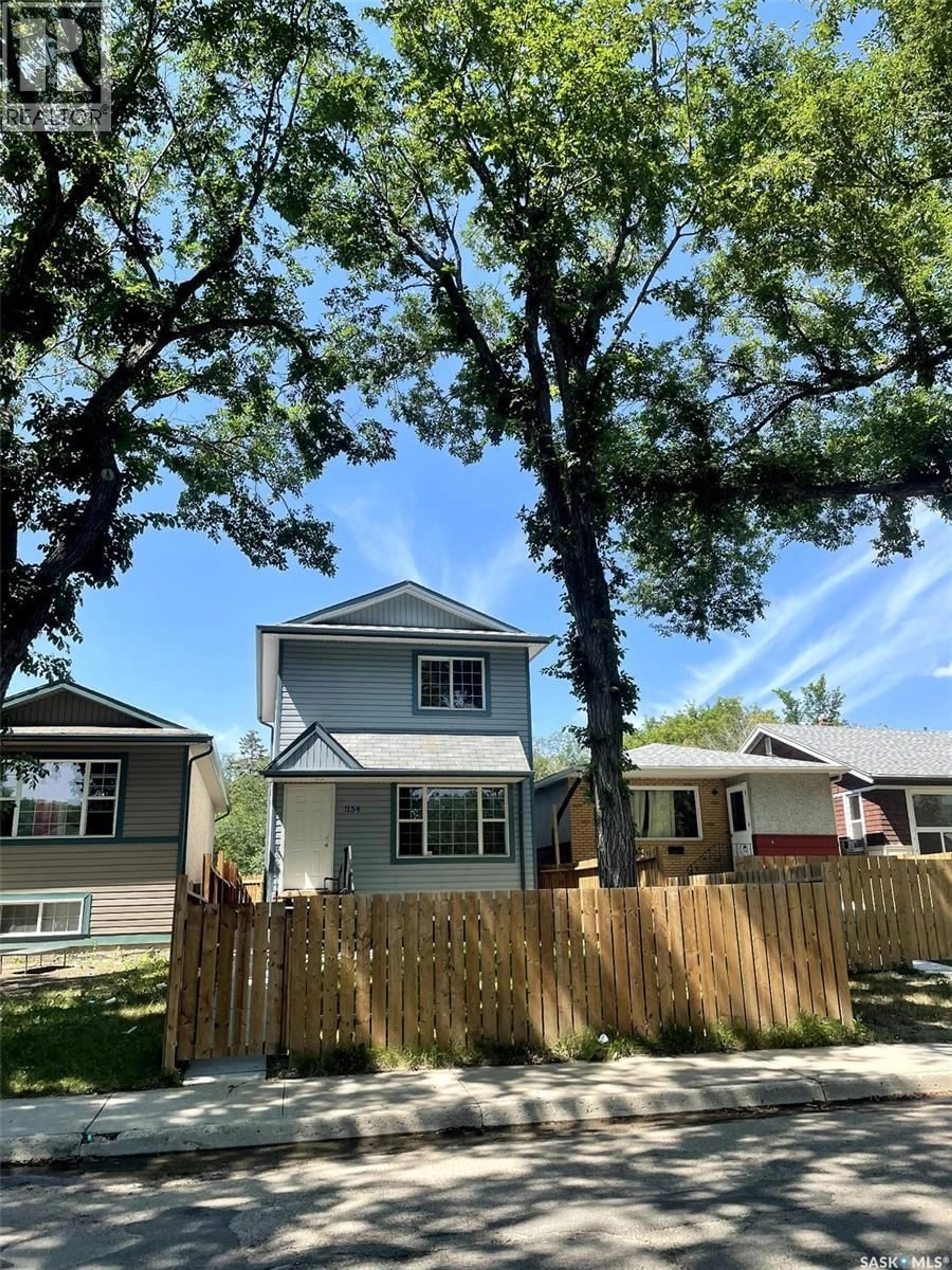 Home with vinyl exterior material, street for 1154 RETALLACK STREET, Regina Saskatchewan S4T2H3