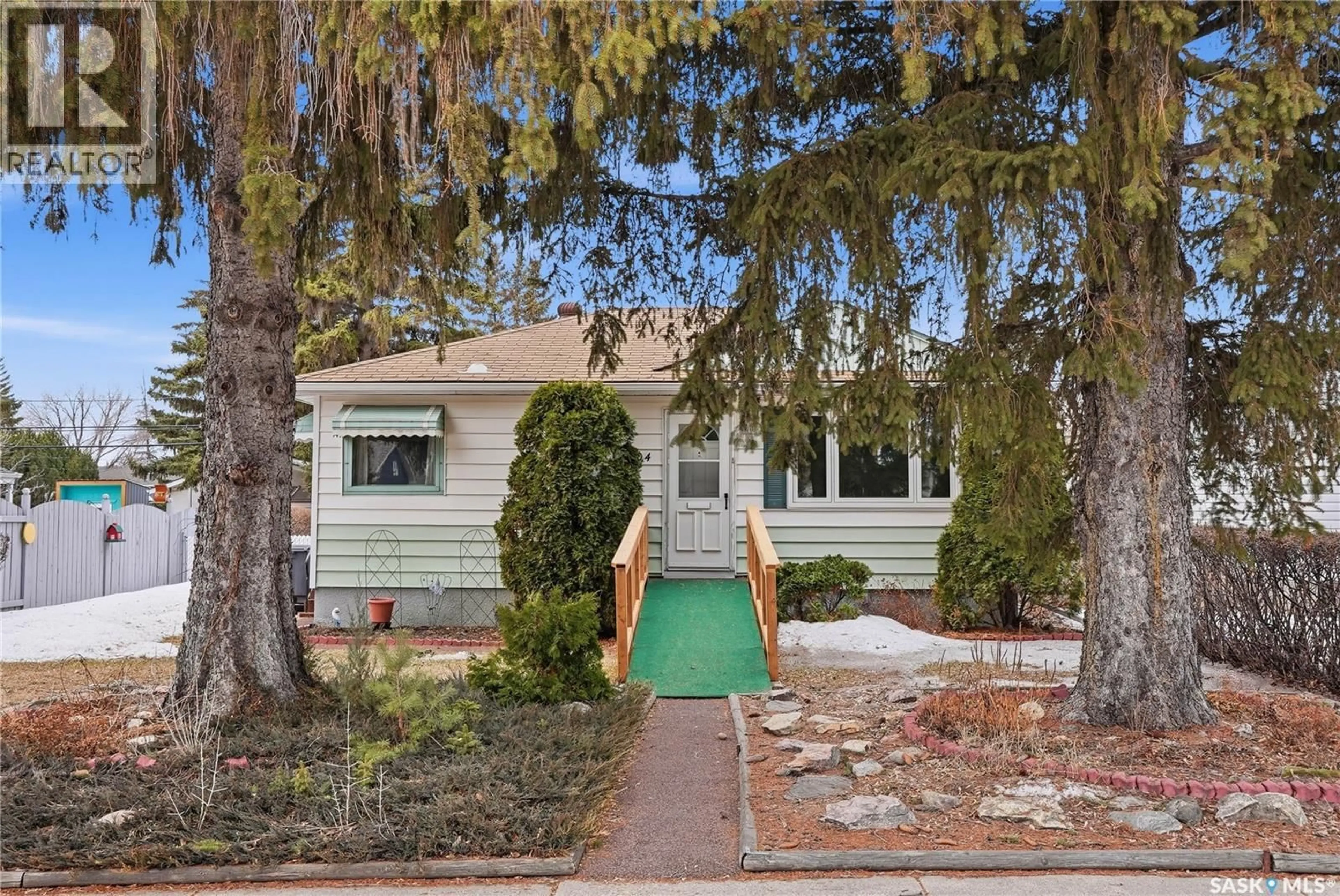 Home with vinyl exterior material, street for 2204 YORK AVENUE, Saskatoon Saskatchewan S7J1J1