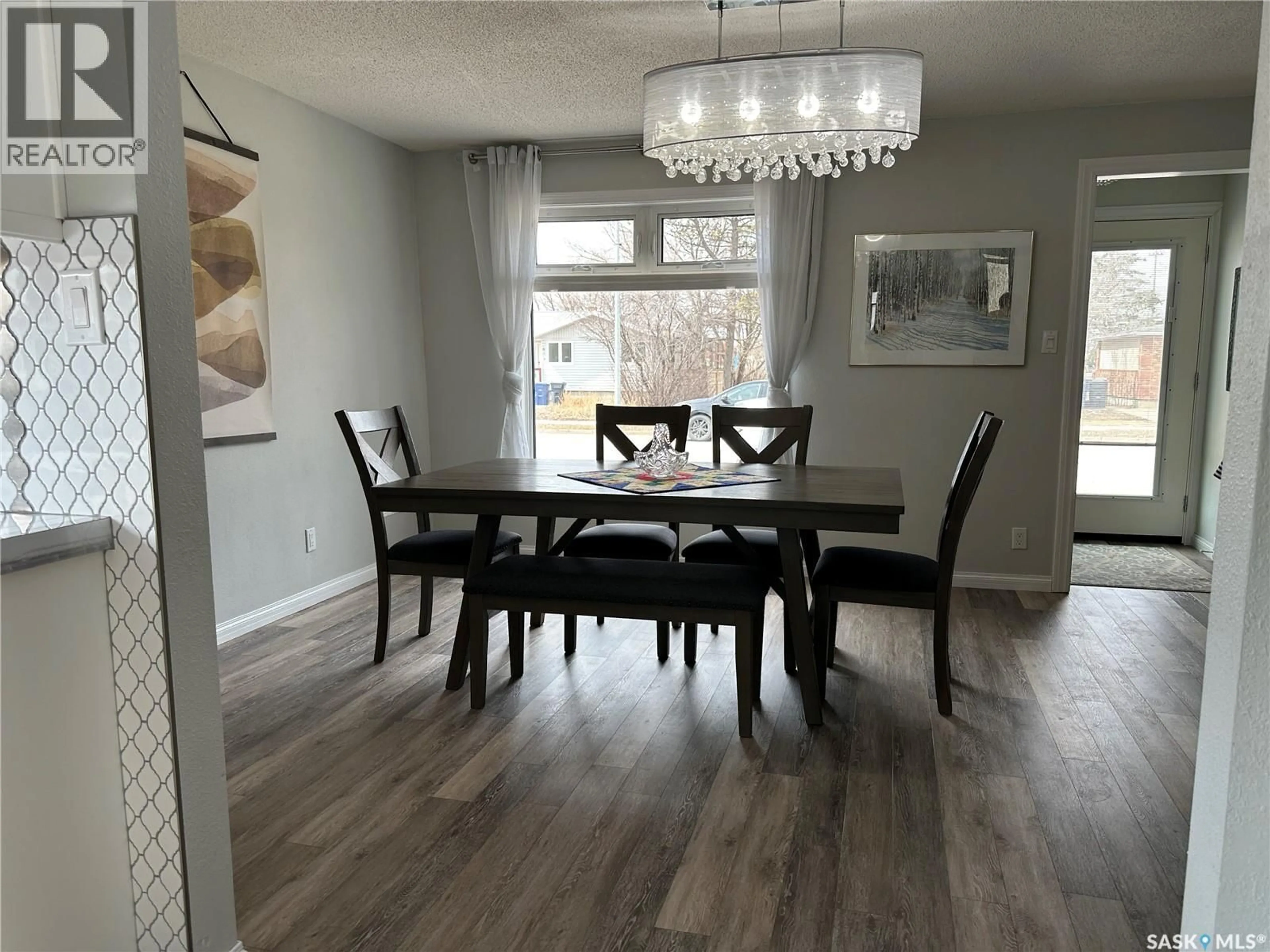 Dining room, wood/laminate floor for 414 GOVERNMENT ROAD, Weyburn Saskatchewan S4H0P6