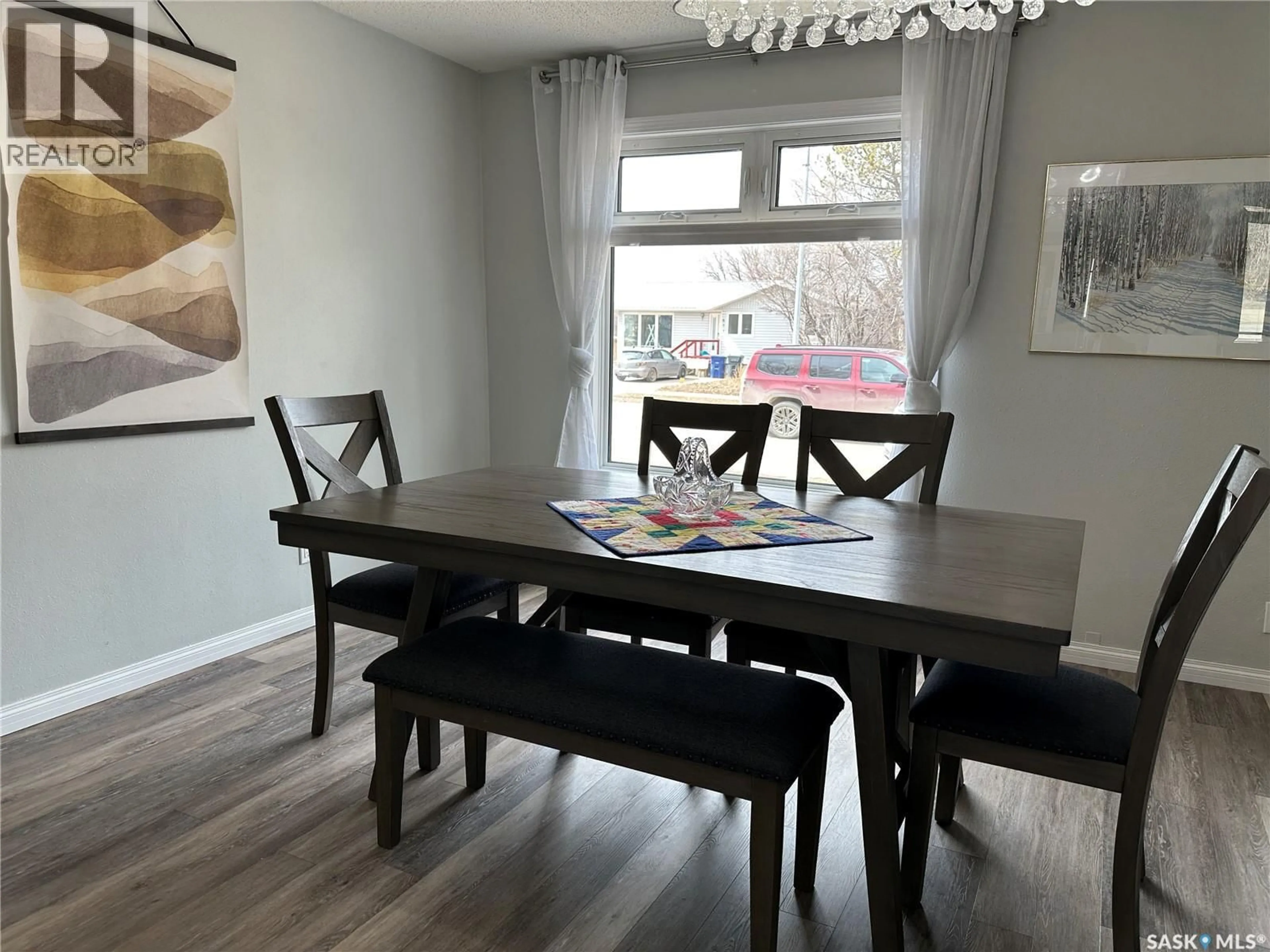 Dining room, wood/laminate floor for 414 GOVERNMENT ROAD, Weyburn Saskatchewan S4H0P6