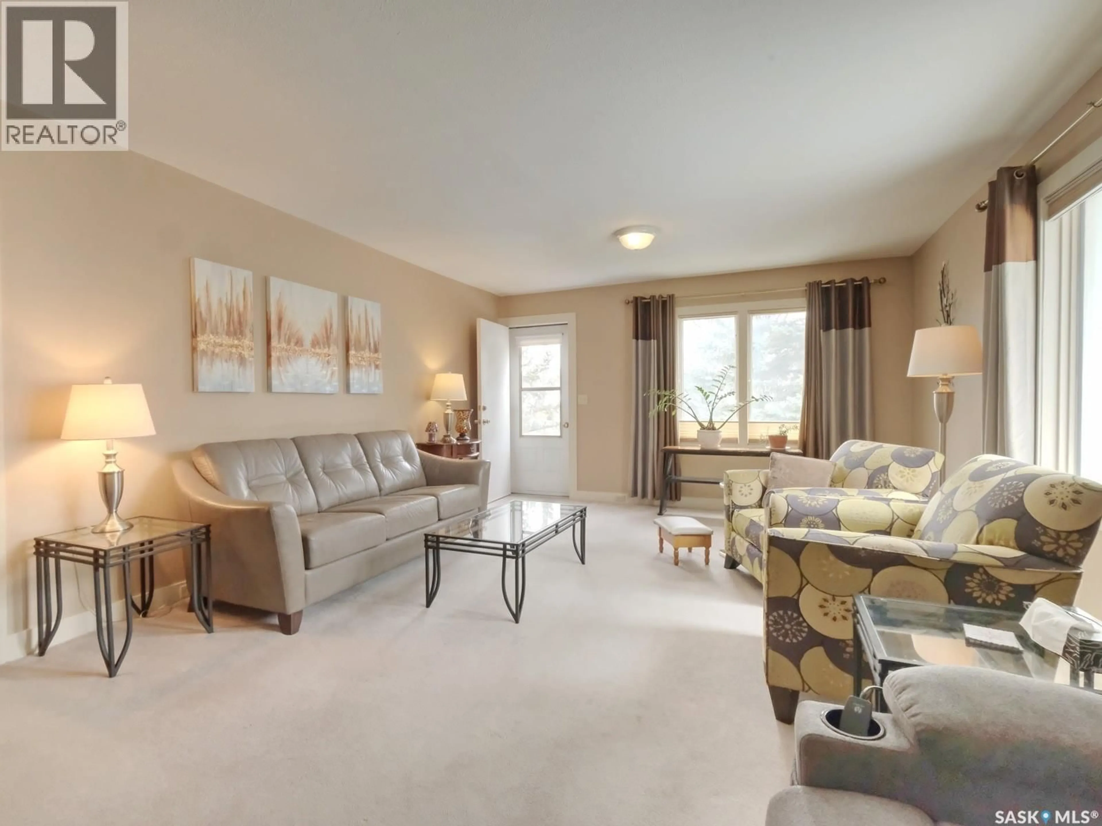 Living room with furniture, carpet floor for 715 KING STREET, Rosetown Saskatchewan S0L2V0