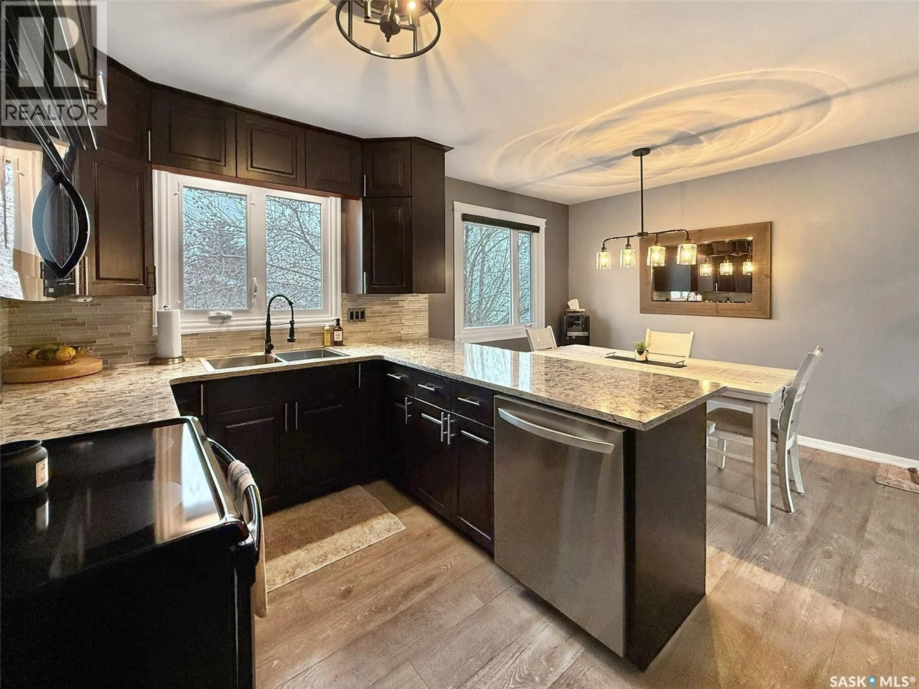 Open concept kitchen, unknown for 611 6TH AVENUE, Swift Current Saskatchewan S9H0Y5