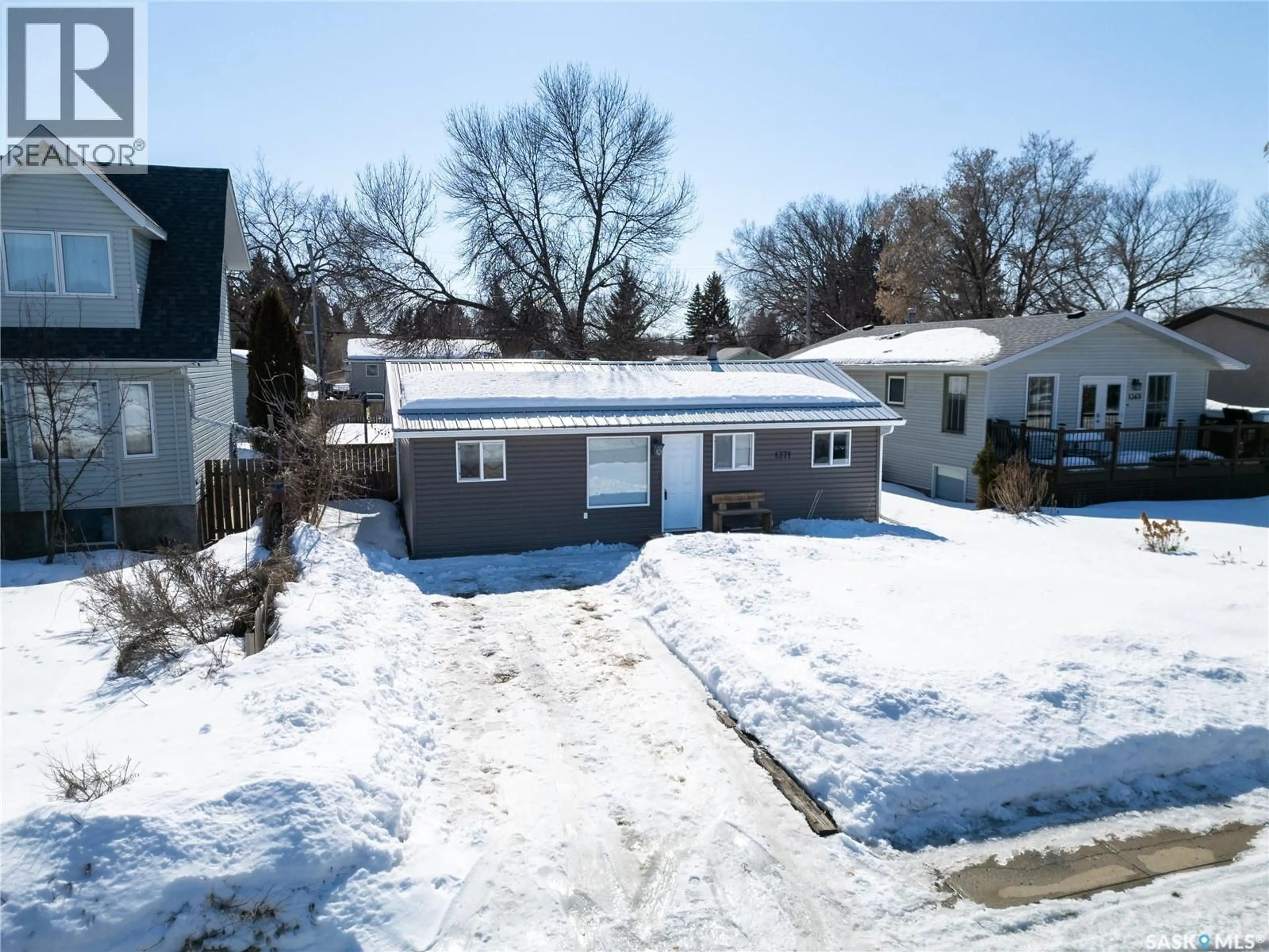 A pic from outside/outdoor area/front of a property/back of a property/a pic from drone, street for 1371 RIVER STREET, Prince Albert Saskatchewan S6V0B8