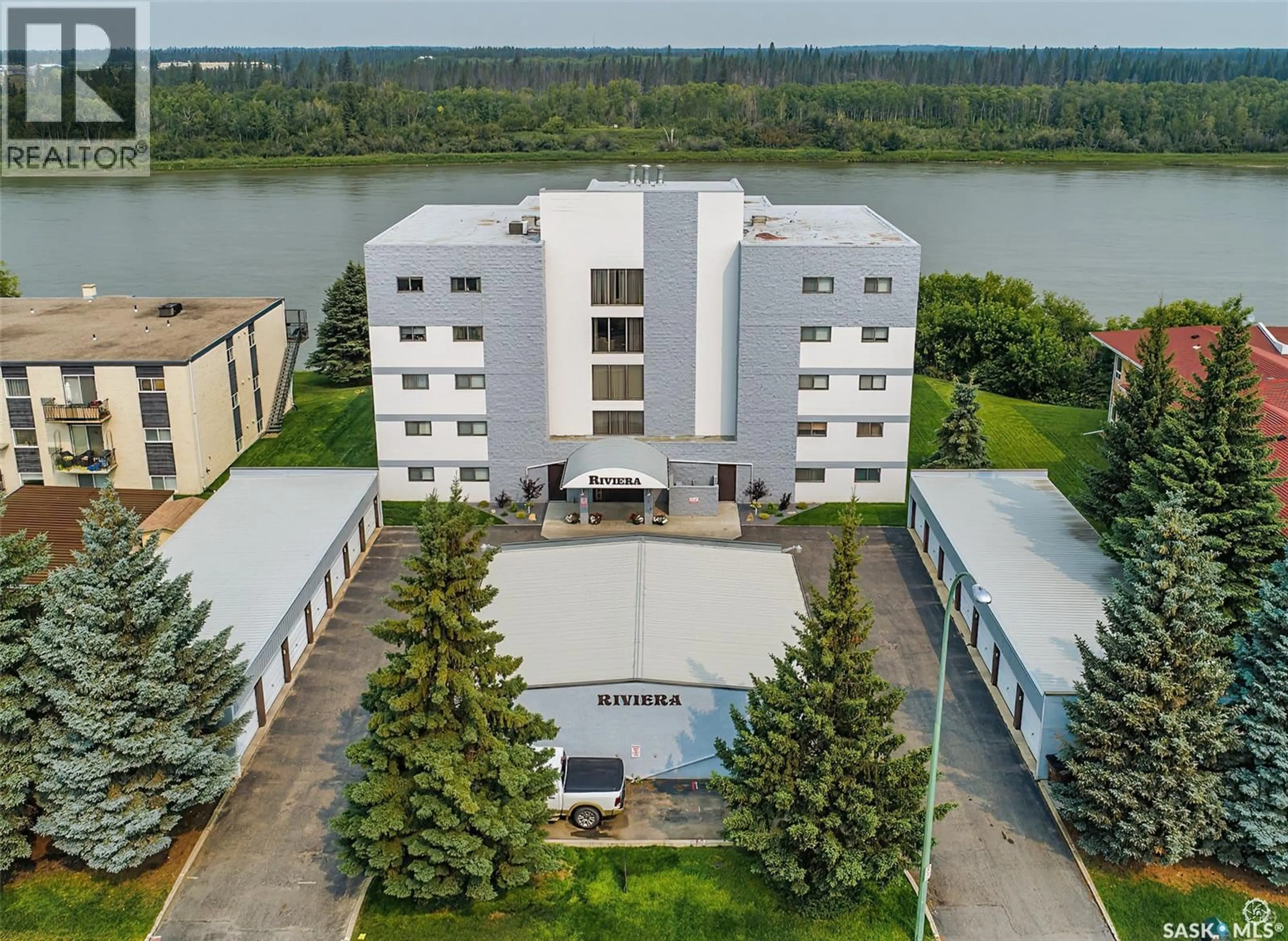 A pic from outside/outdoor area/front of a property/back of a property/a pic from drone, water/lake/river/ocean view for 1B - 516 RIVER STREET, Prince Albert Saskatchewan S6V0A6