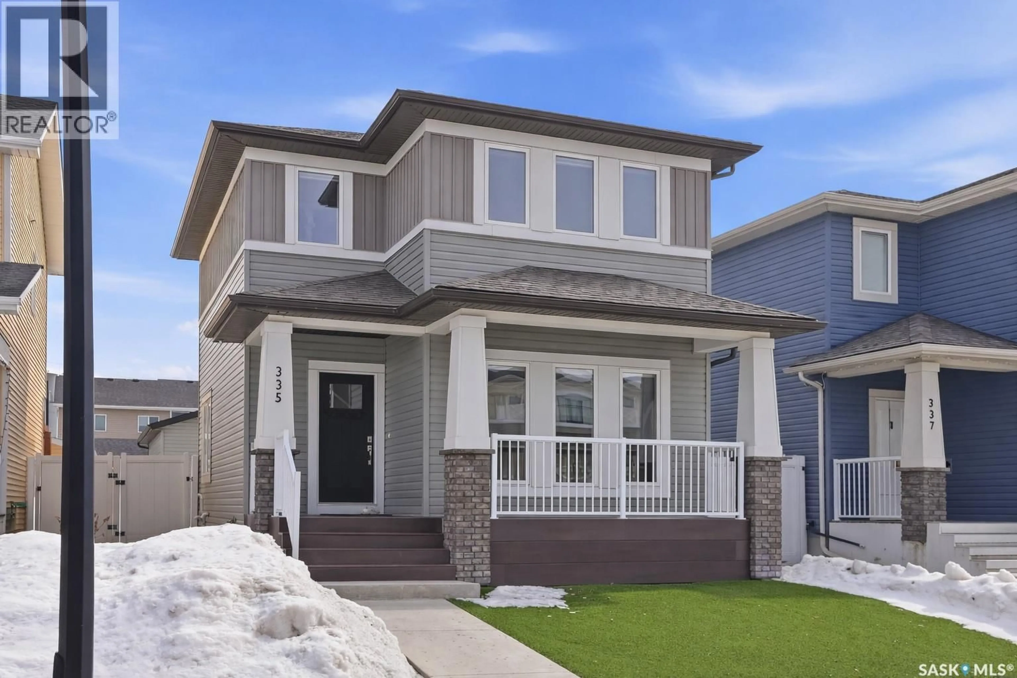 Home with vinyl exterior material, street for 335 SECORD WAY, Saskatoon Saskatchewan S7V0M4