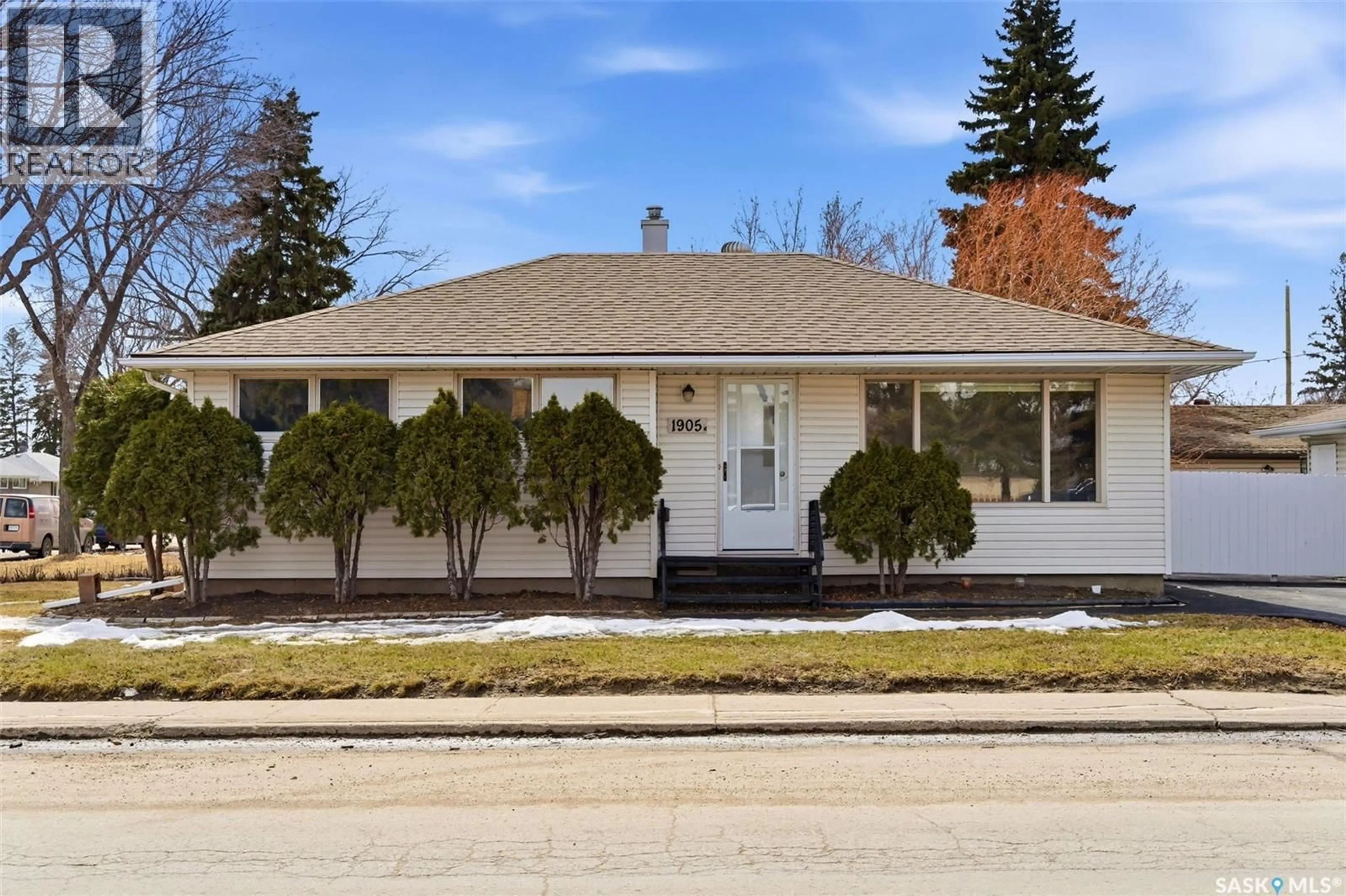 Home with vinyl exterior material, street for 1905 7TH AVENUE, Regina Saskatchewan S4R0J4