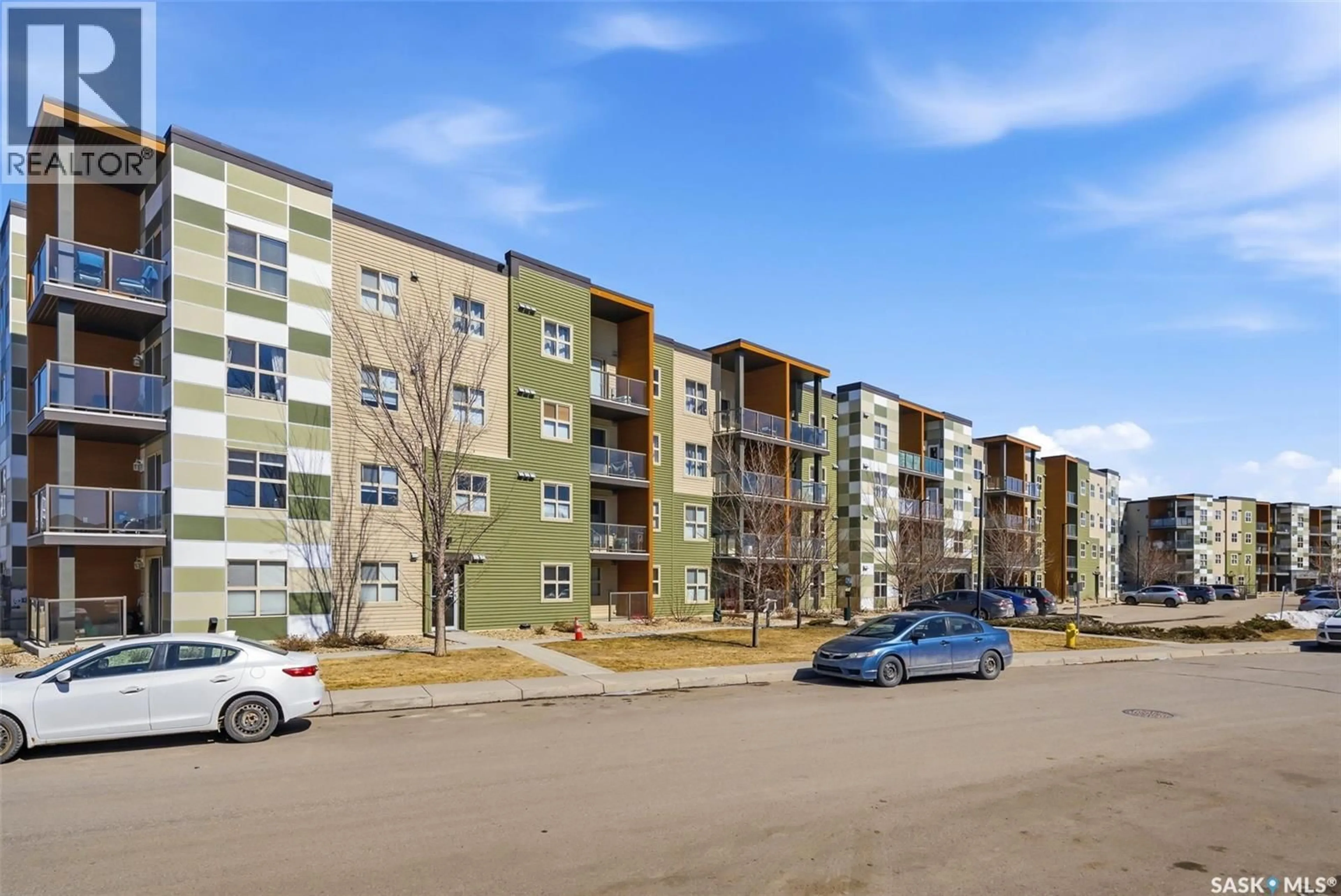 A pic from outside/outdoor area/front of a property/back of a property/a pic from drone, street for 5500 - 2116 MITCHINSON WAY, Regina Saskatchewan S4W0N9