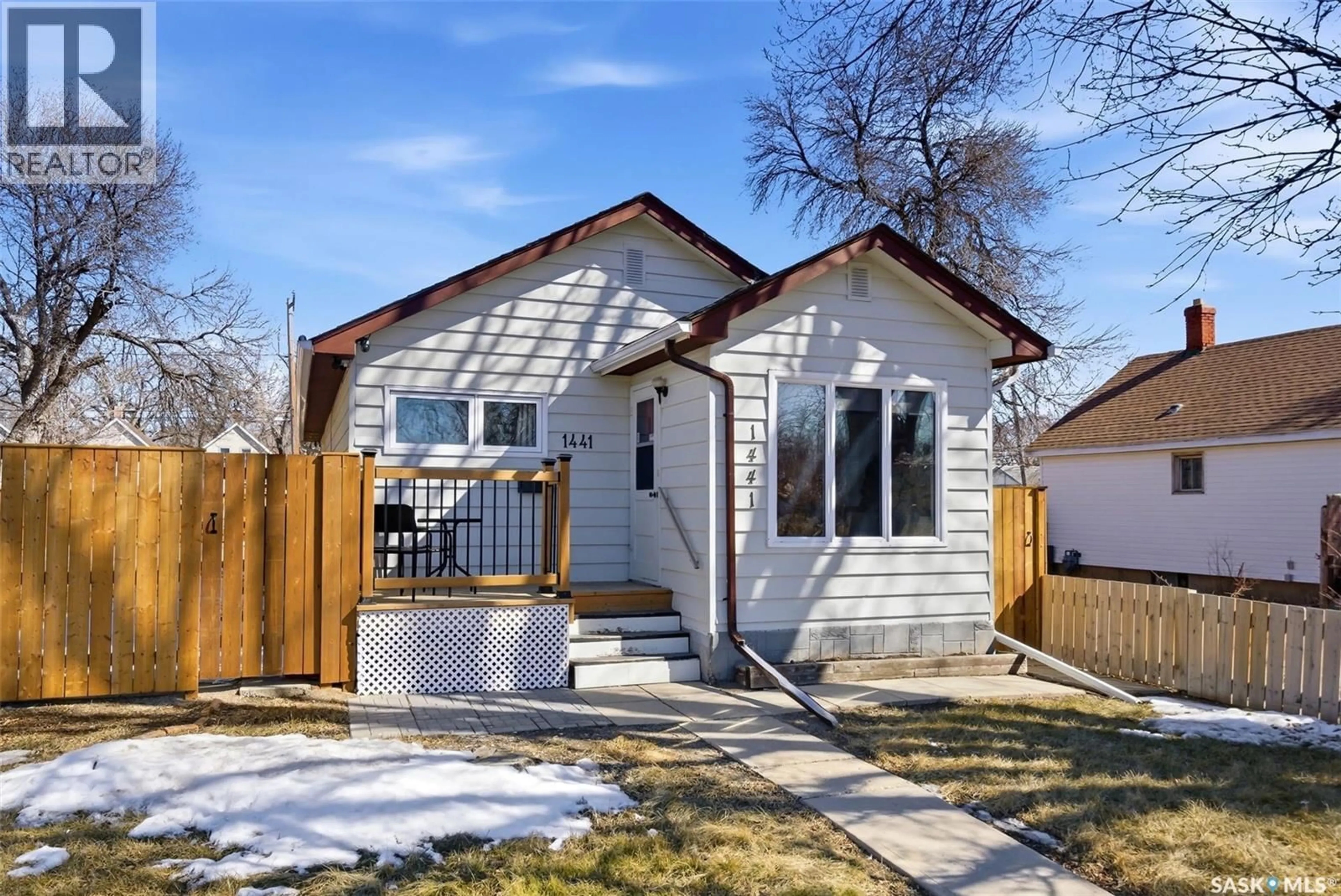 Home with vinyl exterior material, street for 1441 ATHOL STREET, Regina Saskatchewan S4T3C7