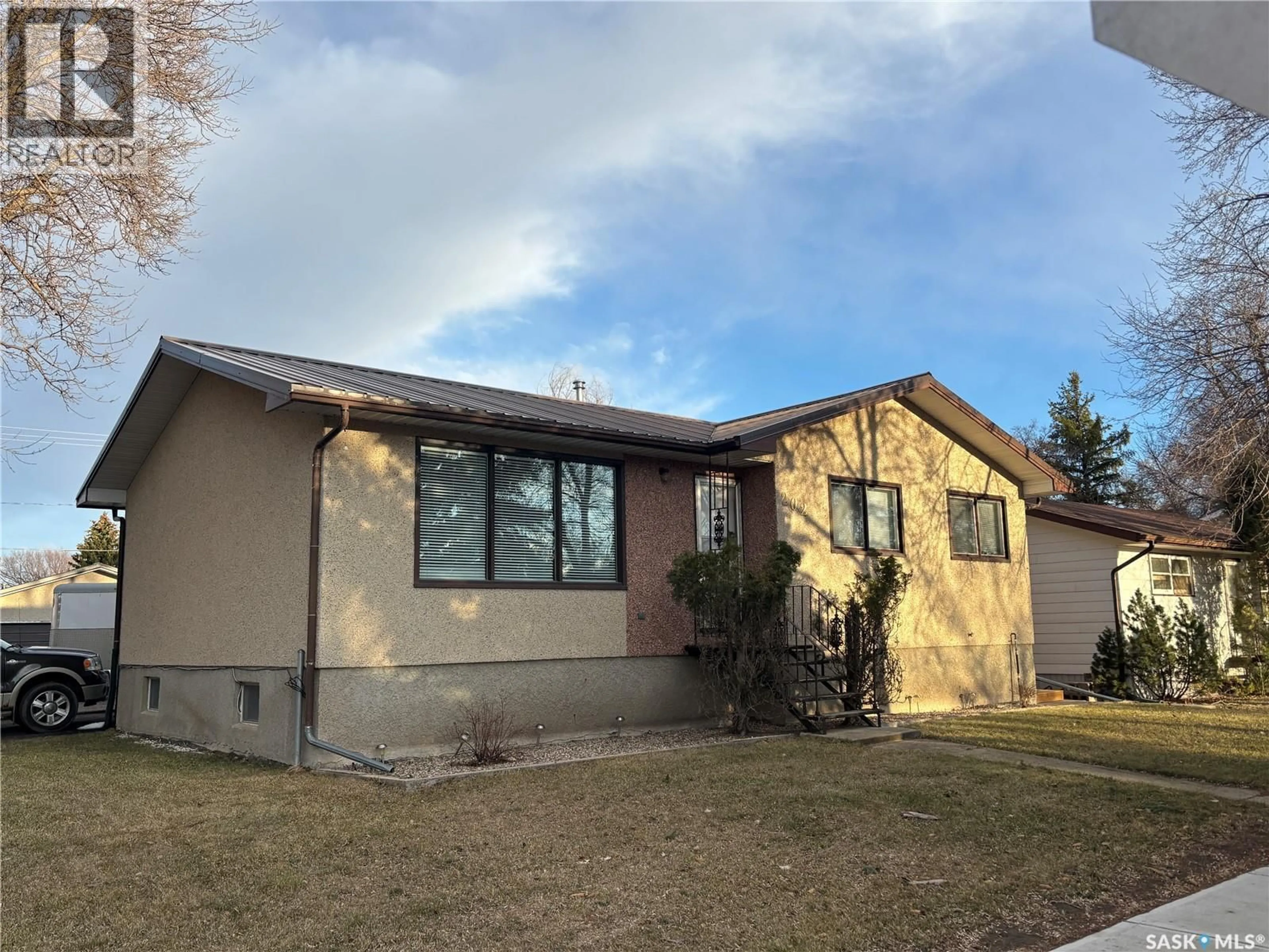 Home with vinyl exterior material, street for 202 HERBERT STREET, Maple Creek Saskatchewan S0N1N0