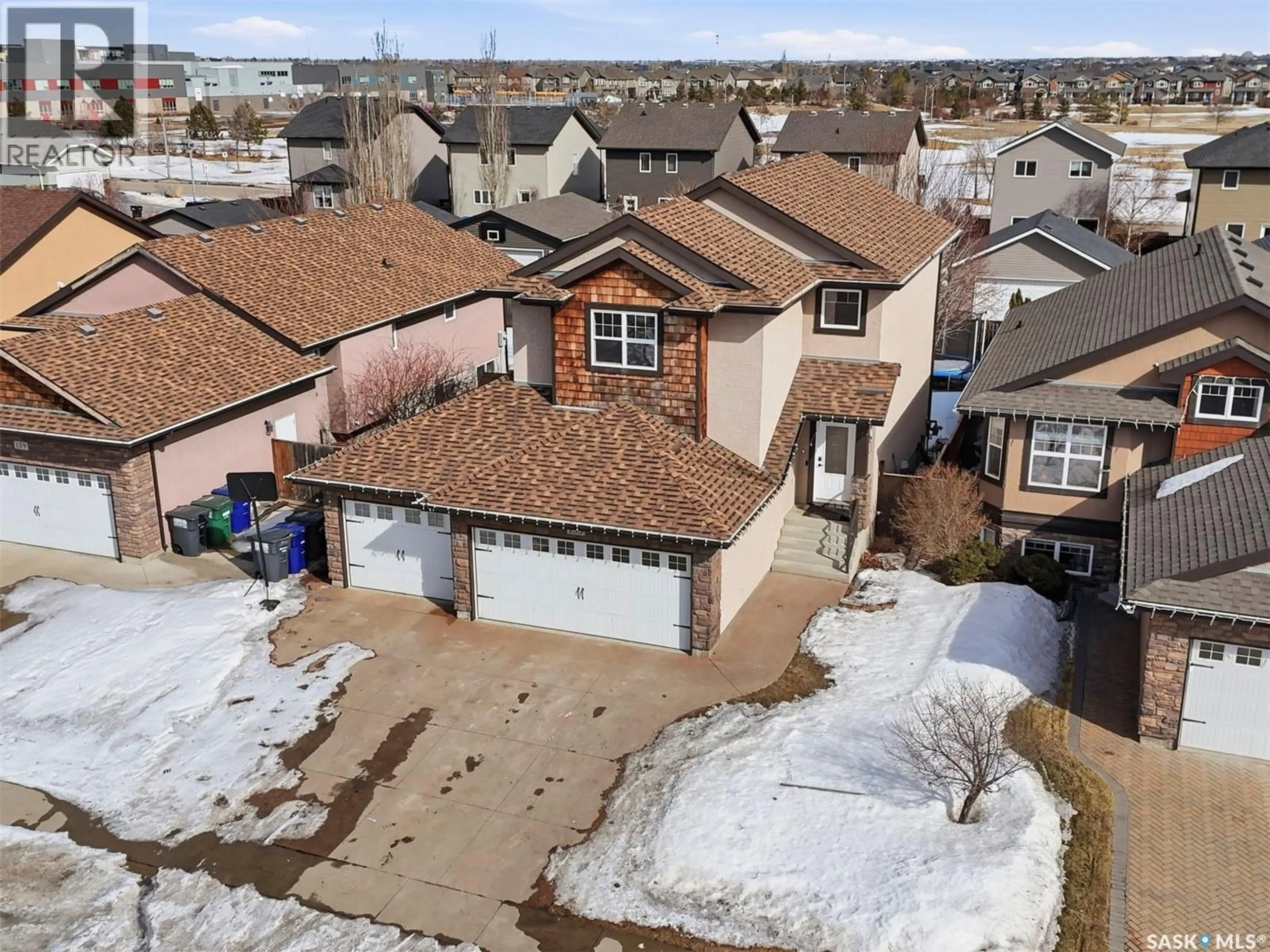 A pic from outside/outdoor area/front of a property/back of a property/a pic from drone, street for 135 BRAINERD CRESCENT, Saskatoon Saskatchewan S7T0H2