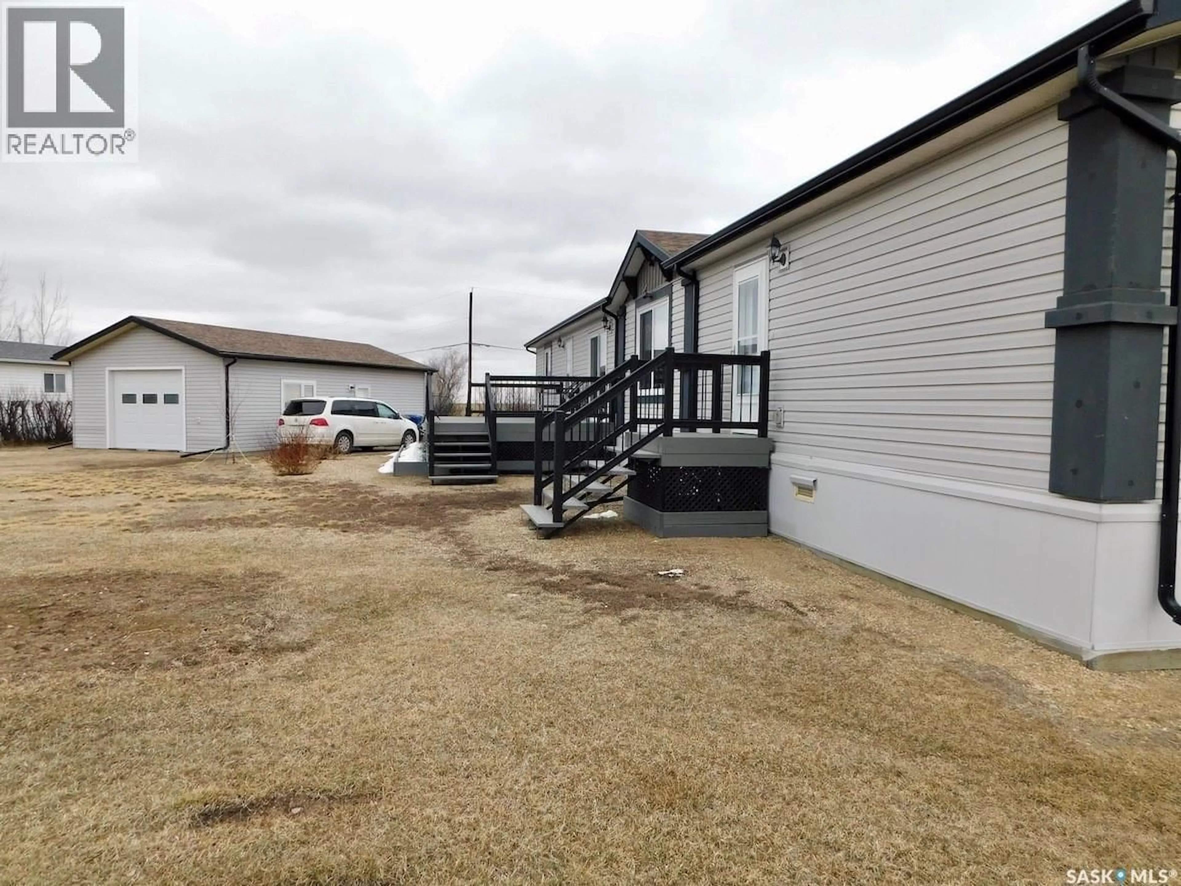 A pic from outside/outdoor area/front of a property/back of a property/a pic from drone, building for 7-9 ALLARD BAY, Gravelbourg Saskatchewan S0H1X0