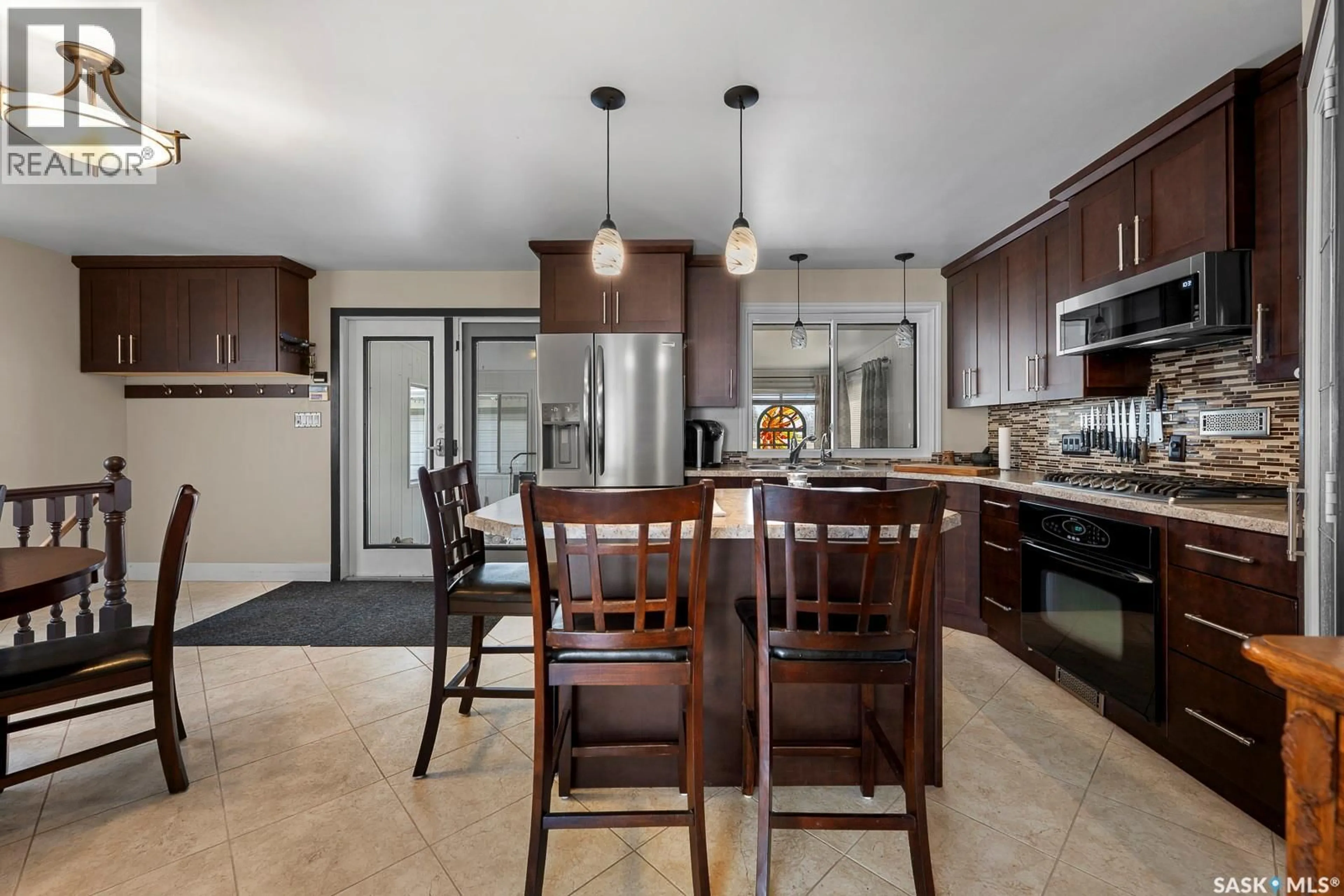 Open concept kitchen, ceramic/tile floor for 132 MCNAB CRESCENT, Regina Saskatchewan S4S4B2