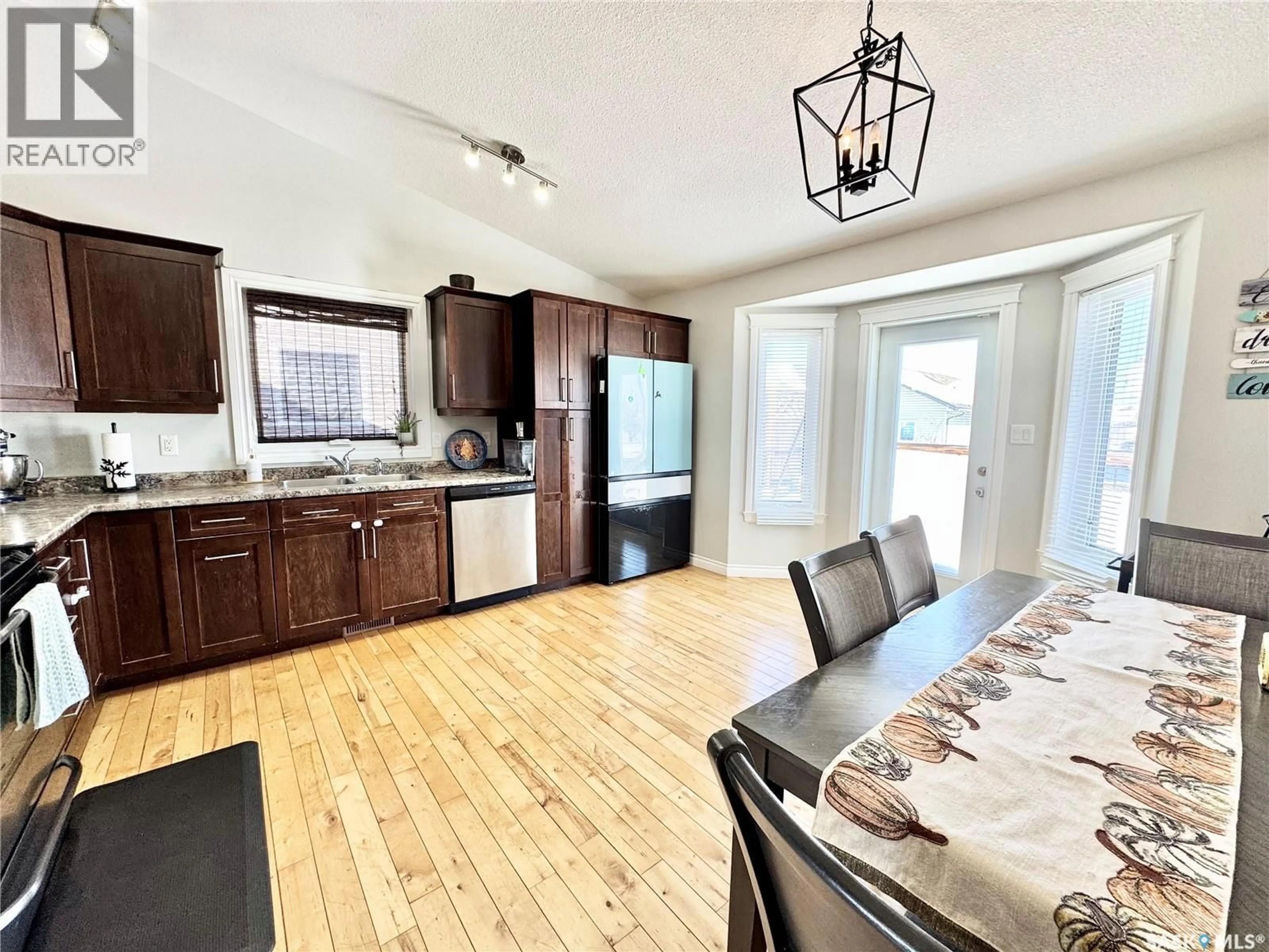 Open concept kitchen, unknown for 42 JOHN HICKS PLACE, Prince Albert Saskatchewan S6V8E5