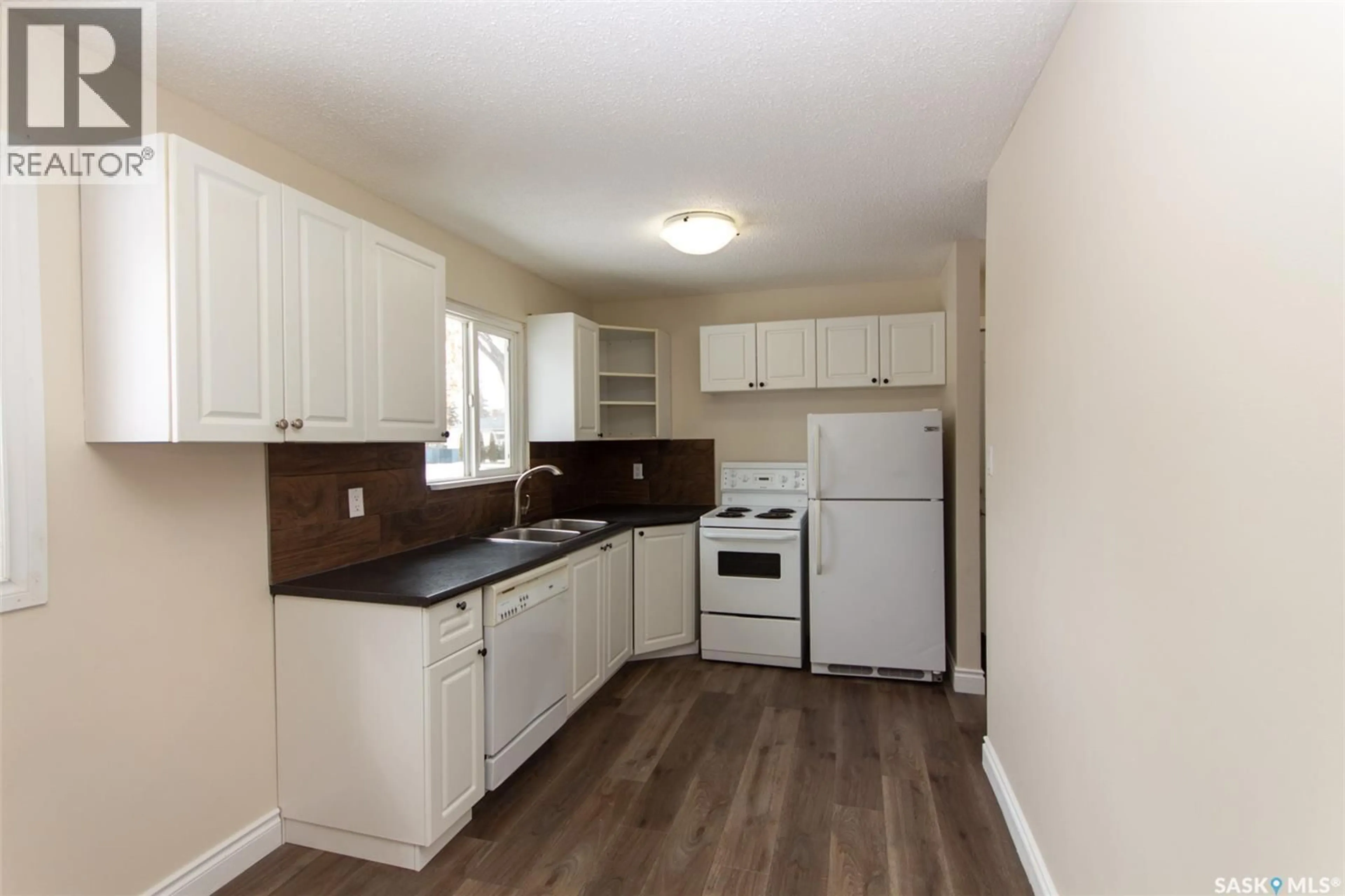 Standard kitchen, wood/laminate floor for 1672 102ND STREET, North Battleford Saskatchewan S9A1H1