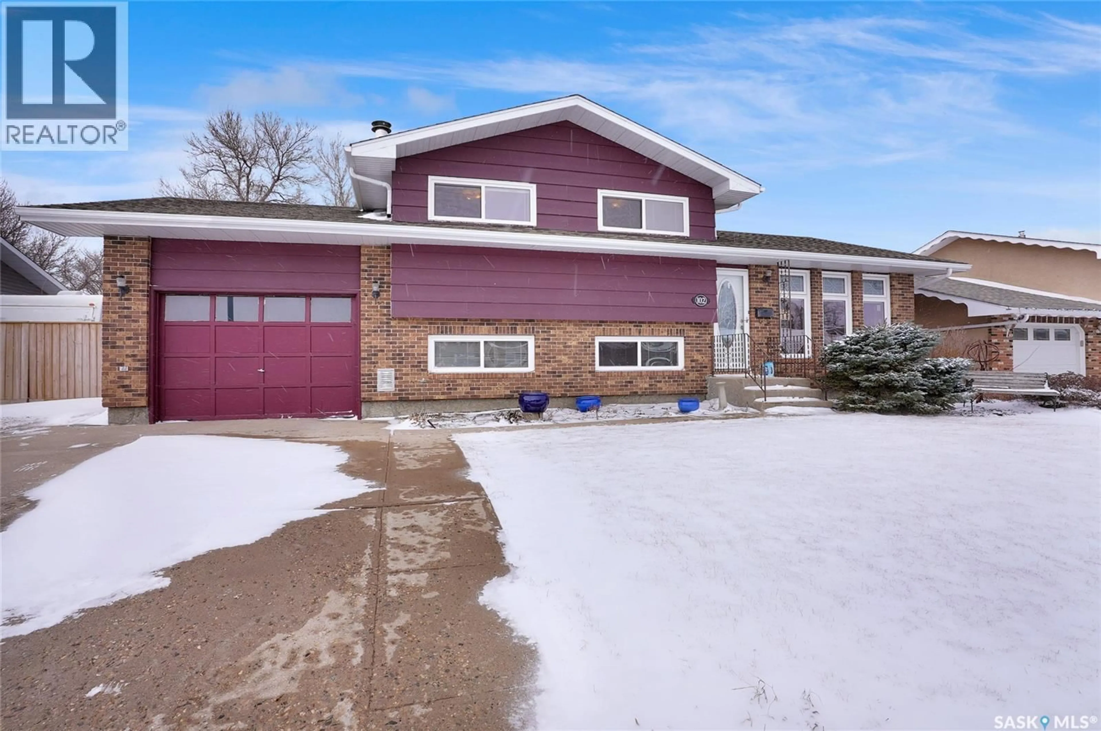 Home with brick exterior material, street for 102 DAISY CRESCENT, Moose Jaw Saskatchewan S6J1C2