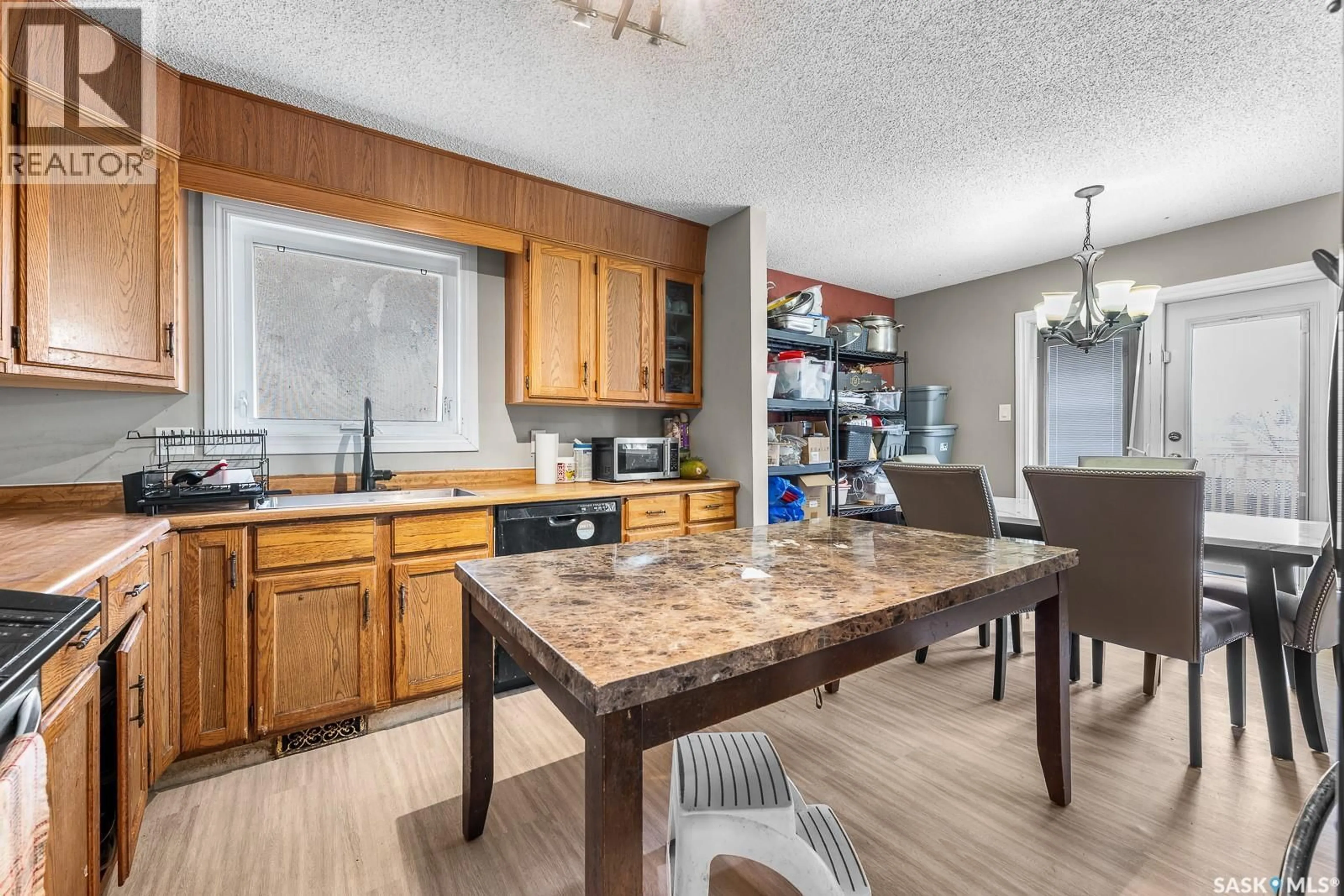 Open concept kitchen, ceramic/tile floor for 2715 CORBETT ROAD, Regina Saskatchewan S4R8J1