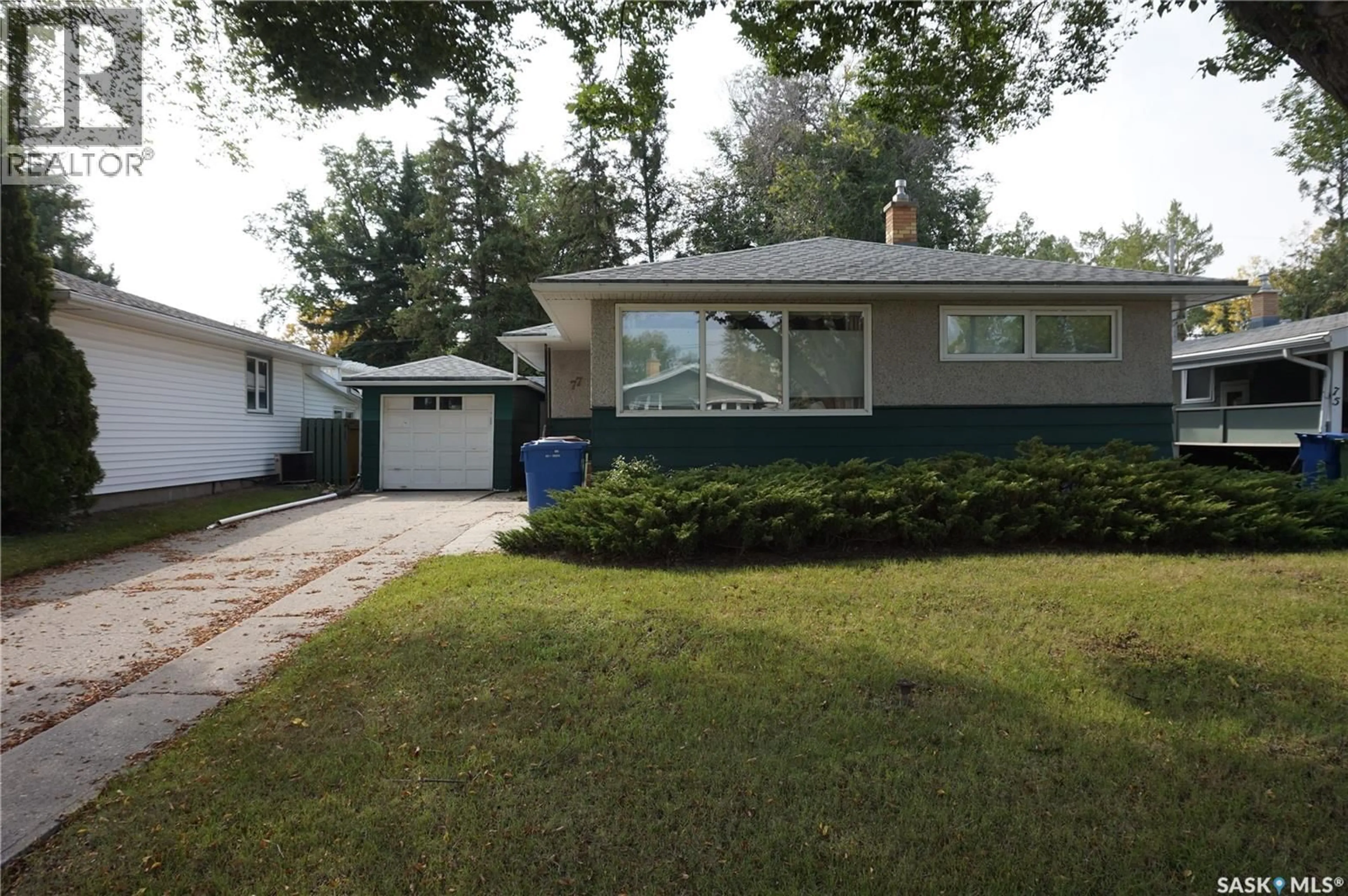 Home with vinyl exterior material, street for 77 MILLAR CRESCENT, Regina Saskatchewan S4S1N3