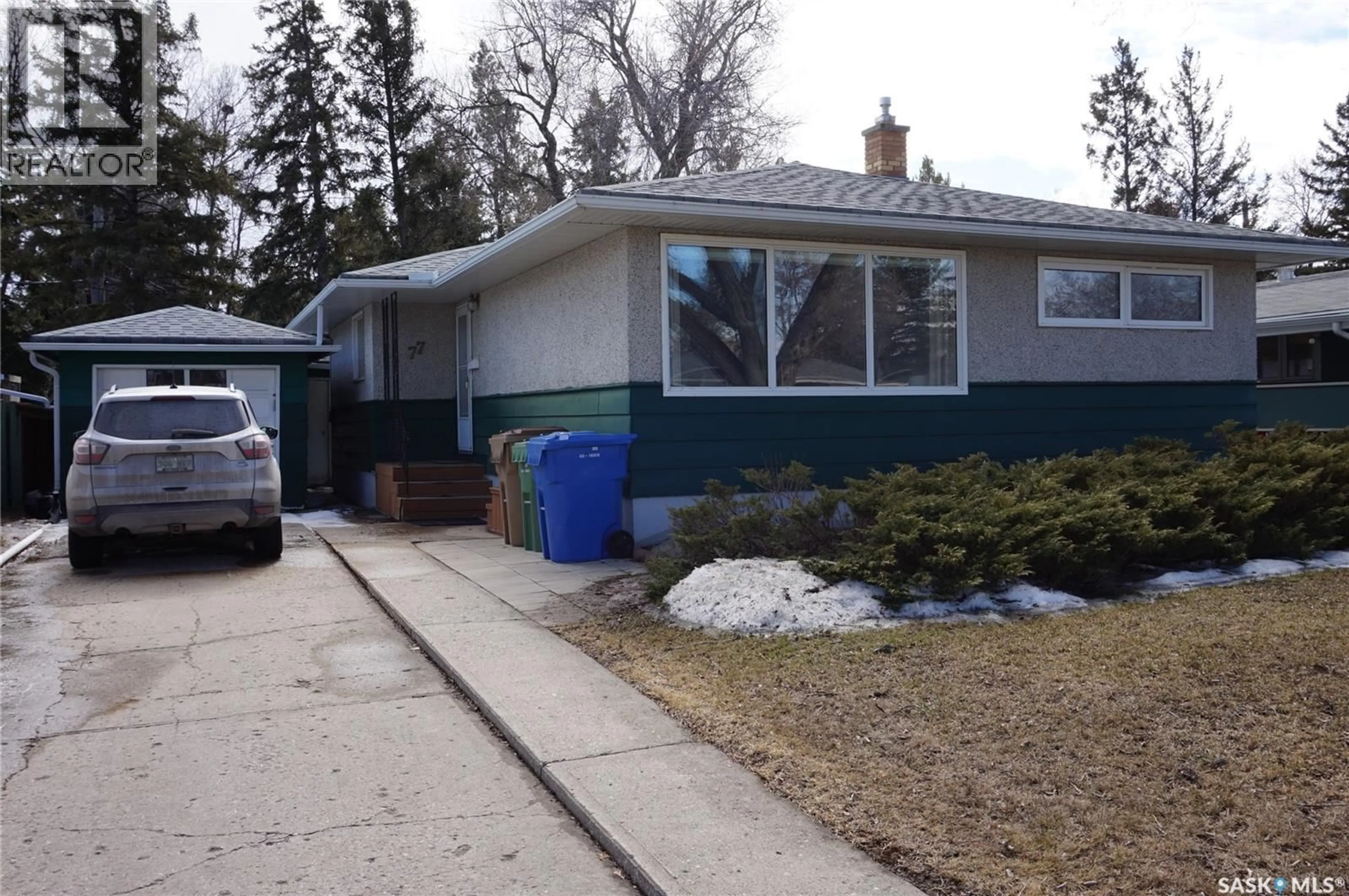 Home with vinyl exterior material, street for 77 MILLAR CRESCENT, Regina Saskatchewan S4S1N3