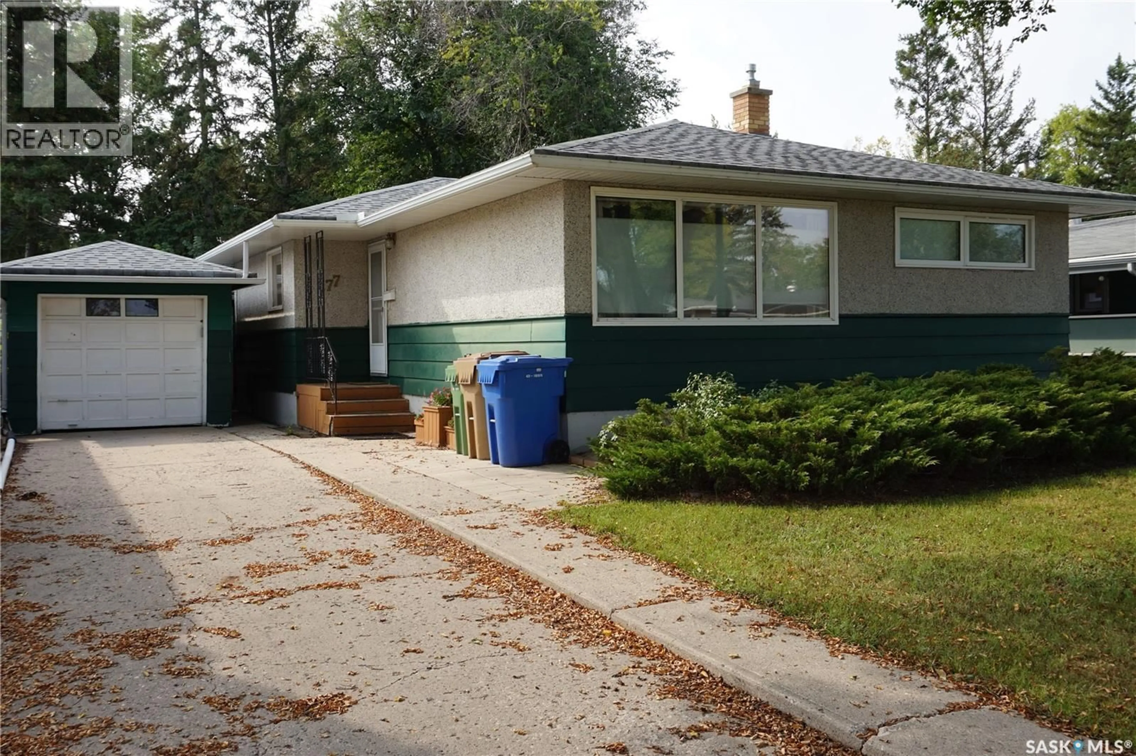 Home with vinyl exterior material, street for 77 MILLAR CRESCENT, Regina Saskatchewan S4S1N3