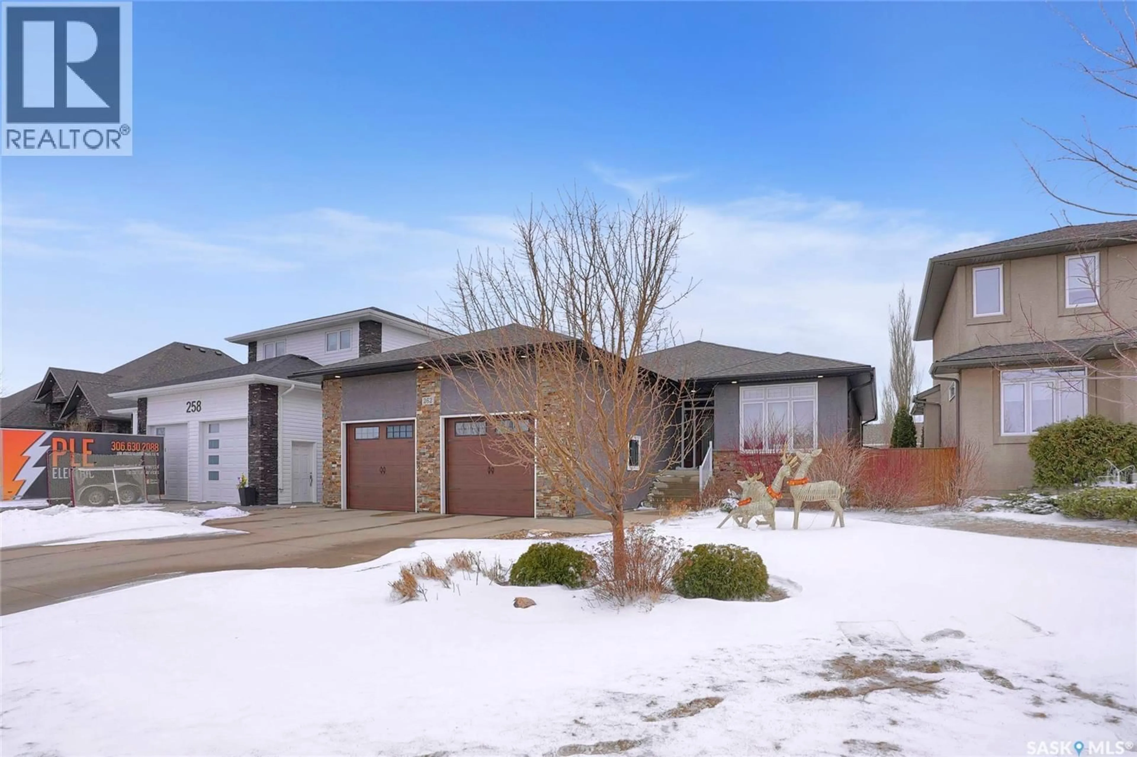 Home with brick exterior material, street for 262 BLUE SAGE DRIVE, Moose Jaw Saskatchewan S6J1N5