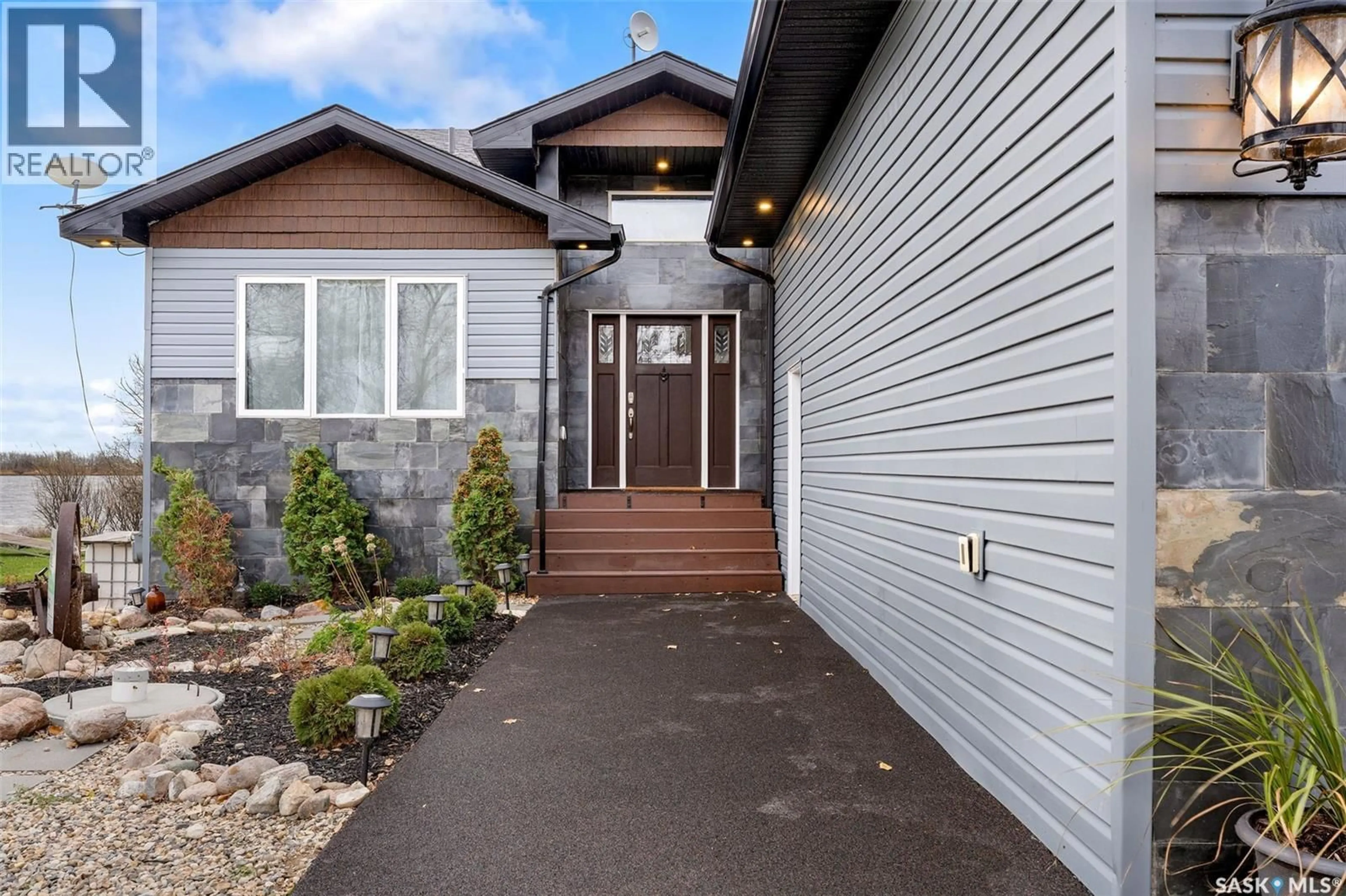 Home with vinyl exterior material, street for 7 PAPE DRIVE, Wolverine Rm No. 340 Saskatchewan S0K2A0