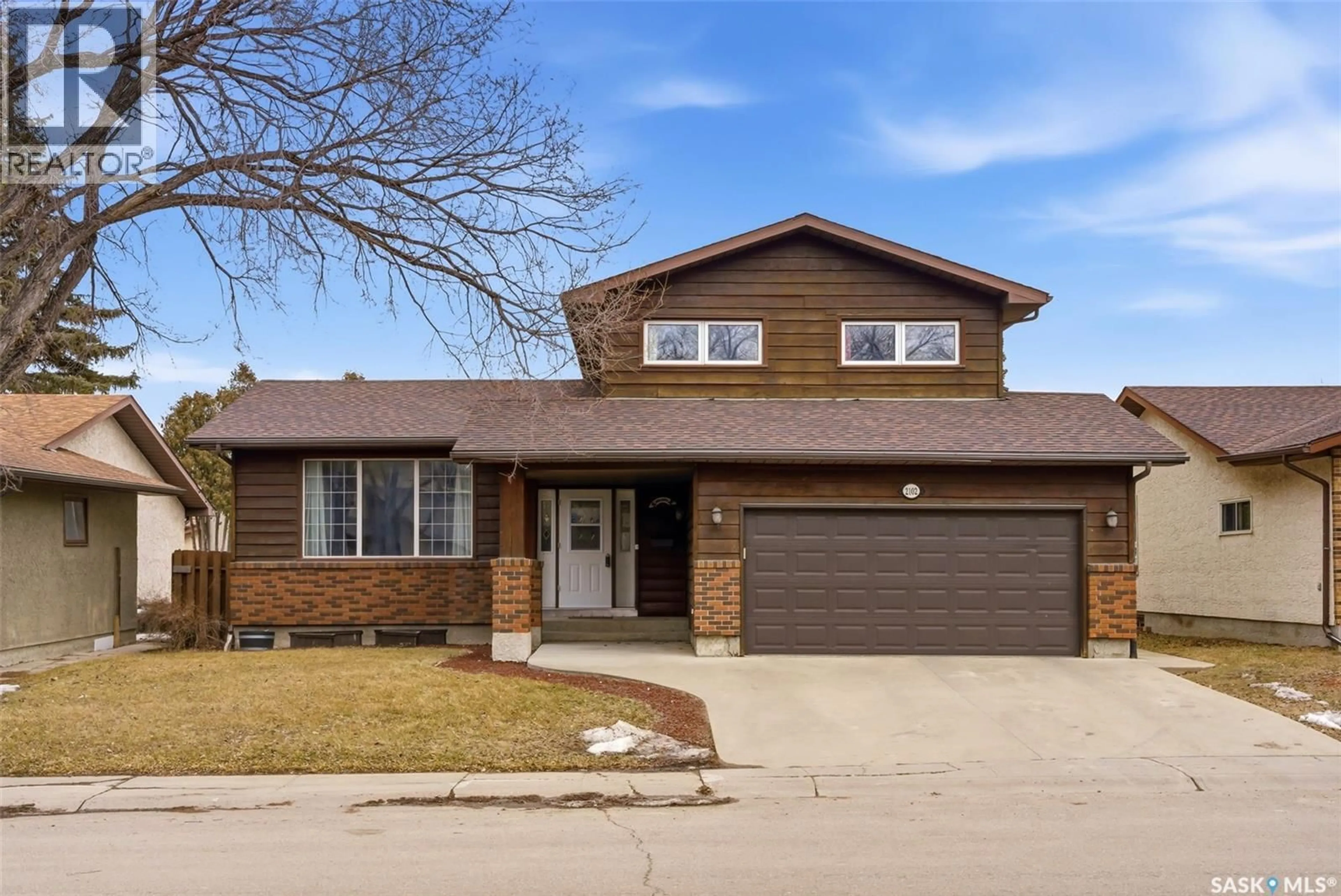 Home with brick exterior material, street for 2102 CUNNING CRESCENT, Regina Saskatchewan S4V0M8