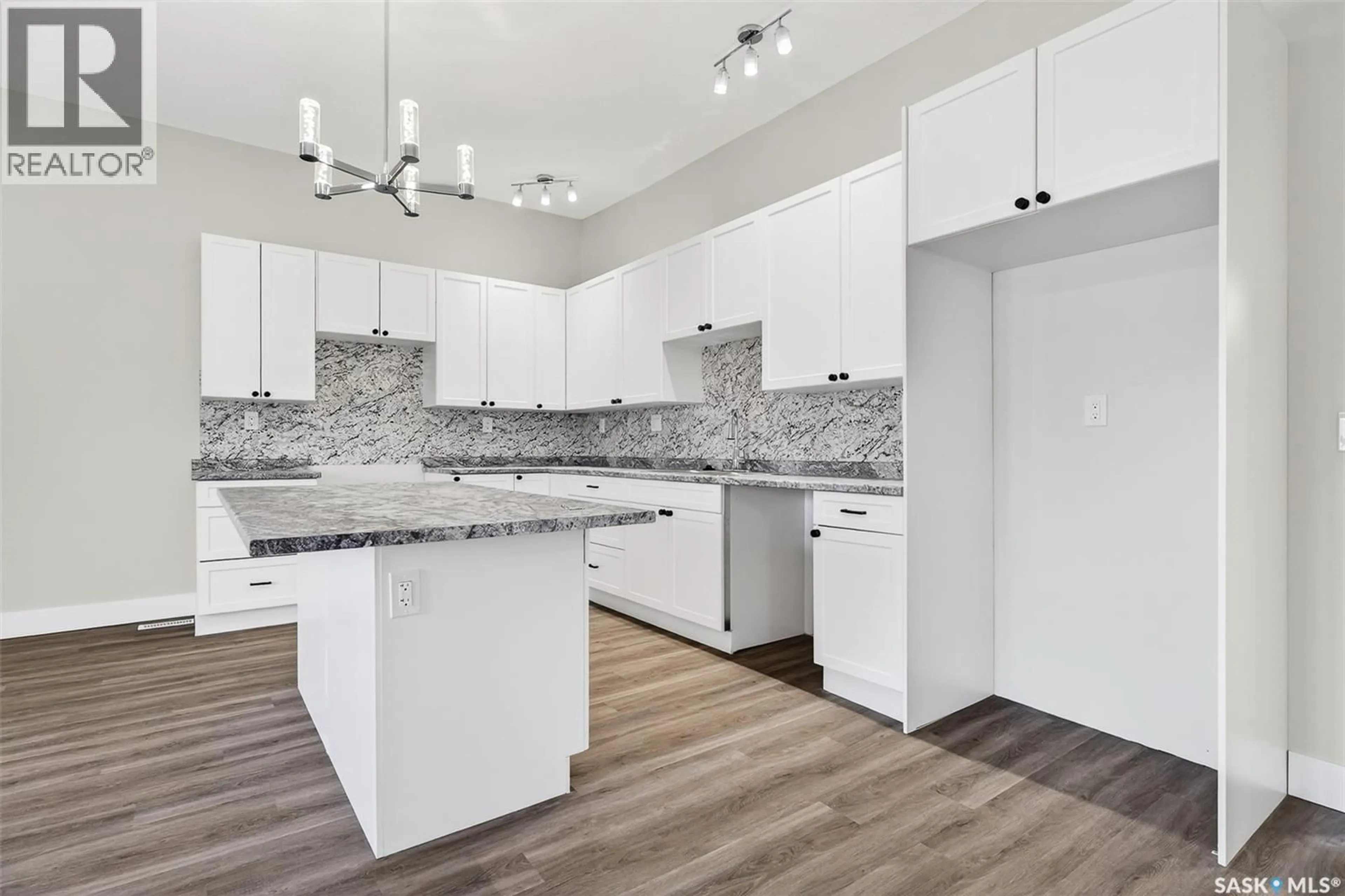 Open concept kitchen, unknown for 933 STADACONA STREET, Moose Jaw Saskatchewan S6H0K7
