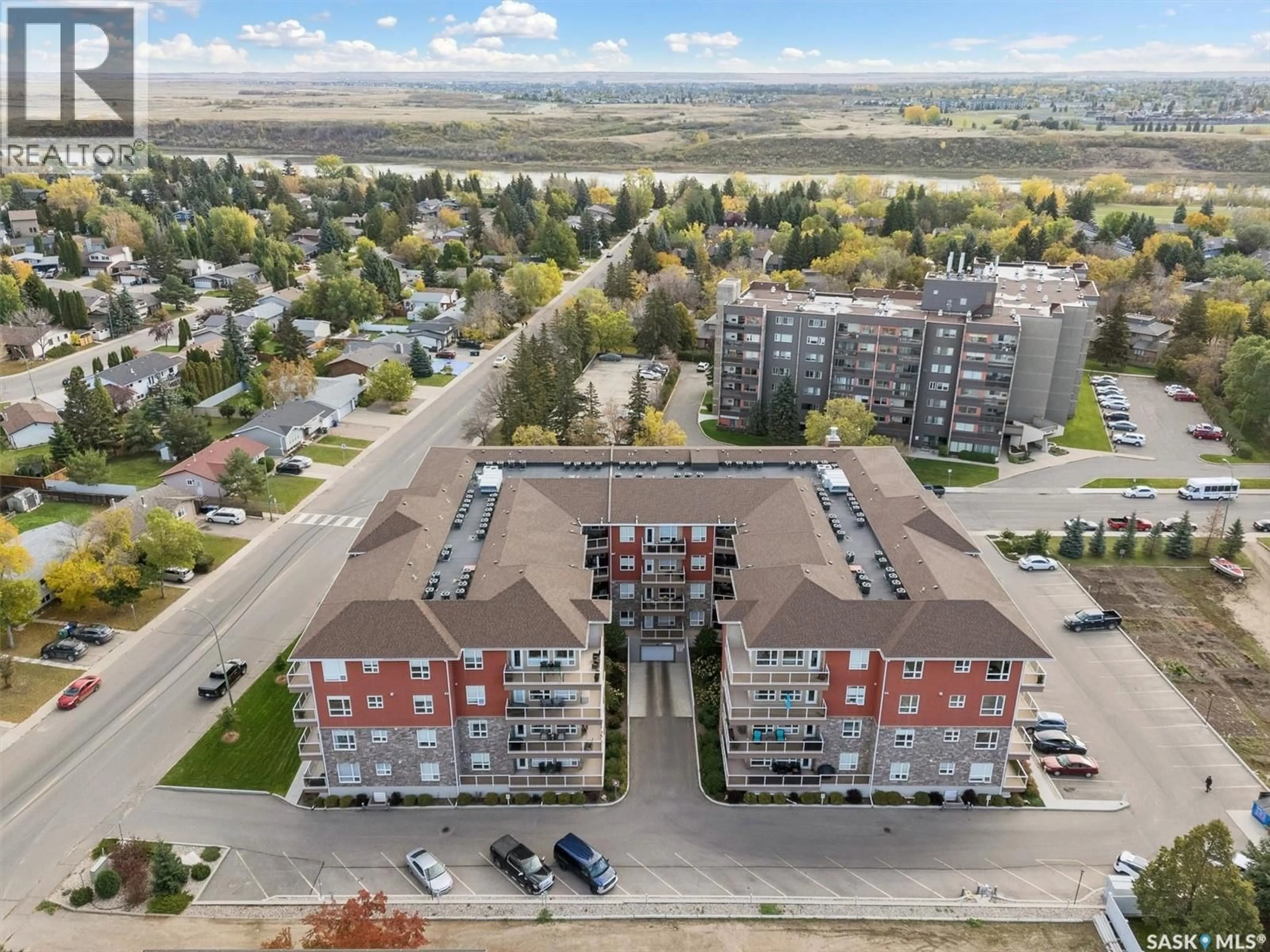 A pic from outside/outdoor area/front of a property/back of a property/a pic from drone, city buildings view from balcony for 108 - 322 SAGUENAY DRIVE, Saskatoon Saskatchewan S7K4E6