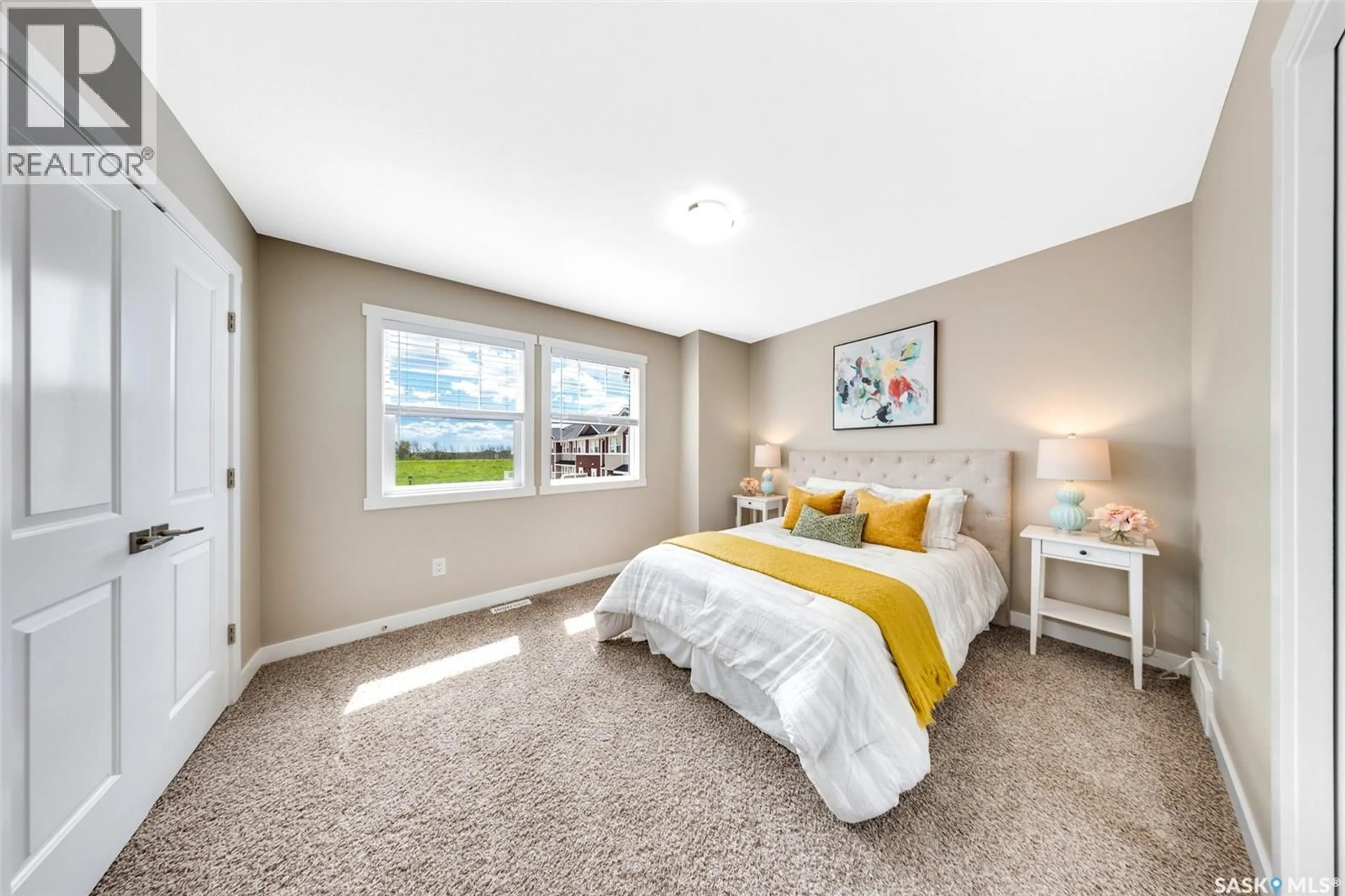 Bedroom with bed, carpet floor for 1220 - 214 PRINGLE WAY, Saskatoon Saskatchewan S7T0V4