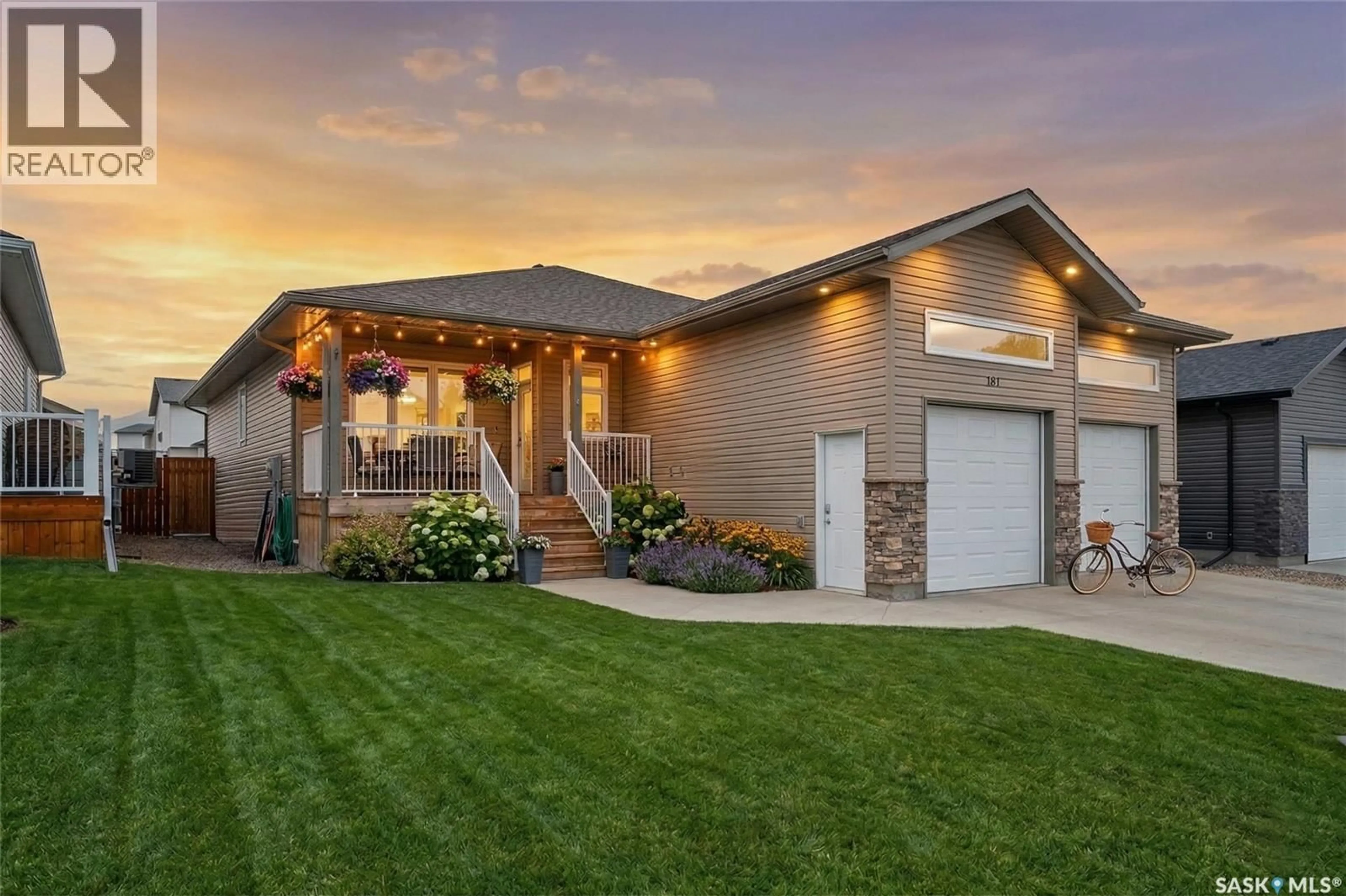 Home with brick exterior material, street for 167 WELLINGTON DRIVE, Moose Jaw Saskatchewan S6K0A6