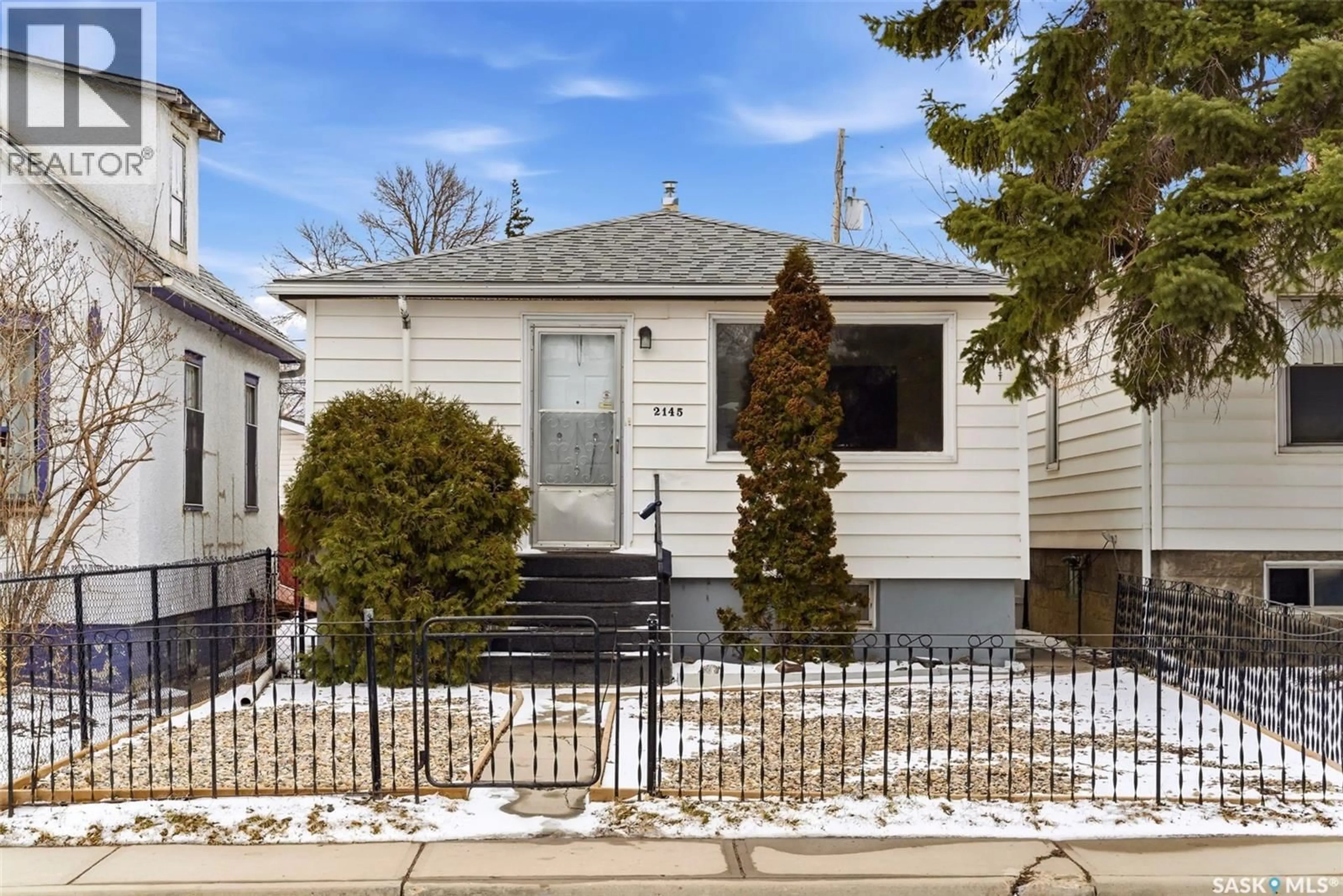 Home with vinyl exterior material, street for 2145 LINDSAY STREET, Regina Saskatchewan S4N3C1