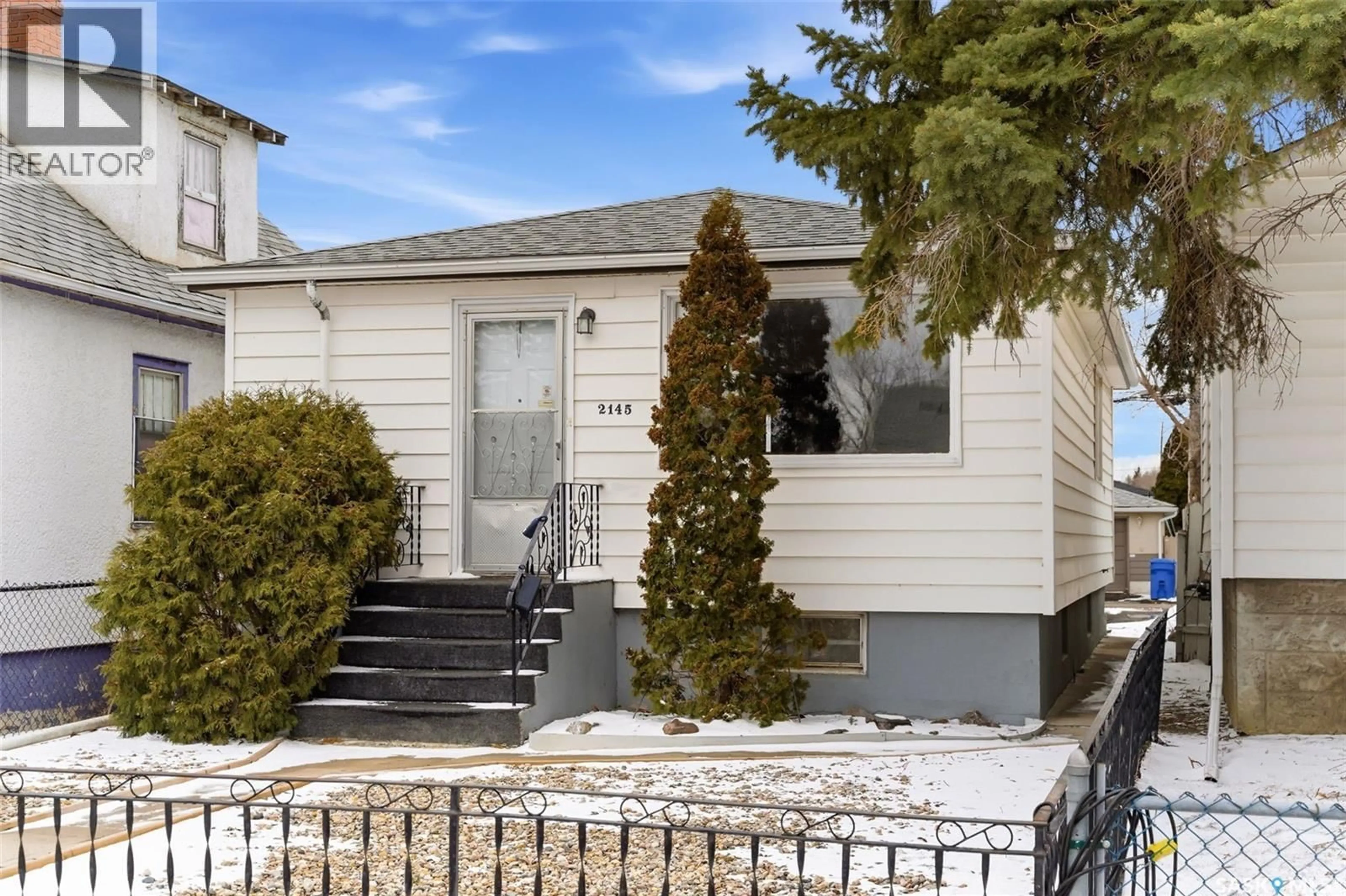 Home with vinyl exterior material, street for 2145 LINDSAY STREET, Regina Saskatchewan S4N3C1
