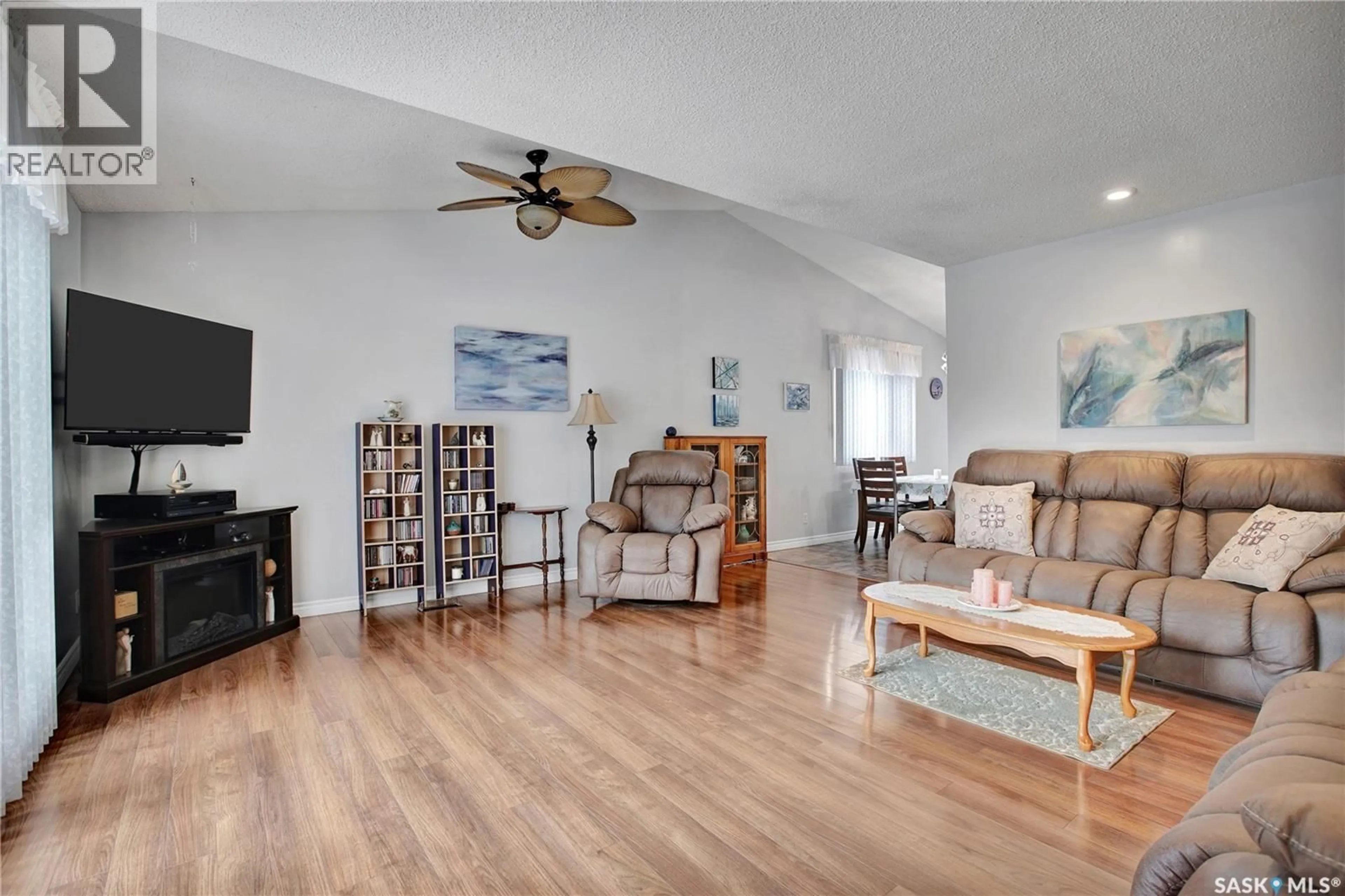 Living room with furniture, unknown for 119 SPINKS DRIVE, Saskatoon Saskatchewan S7H4G8