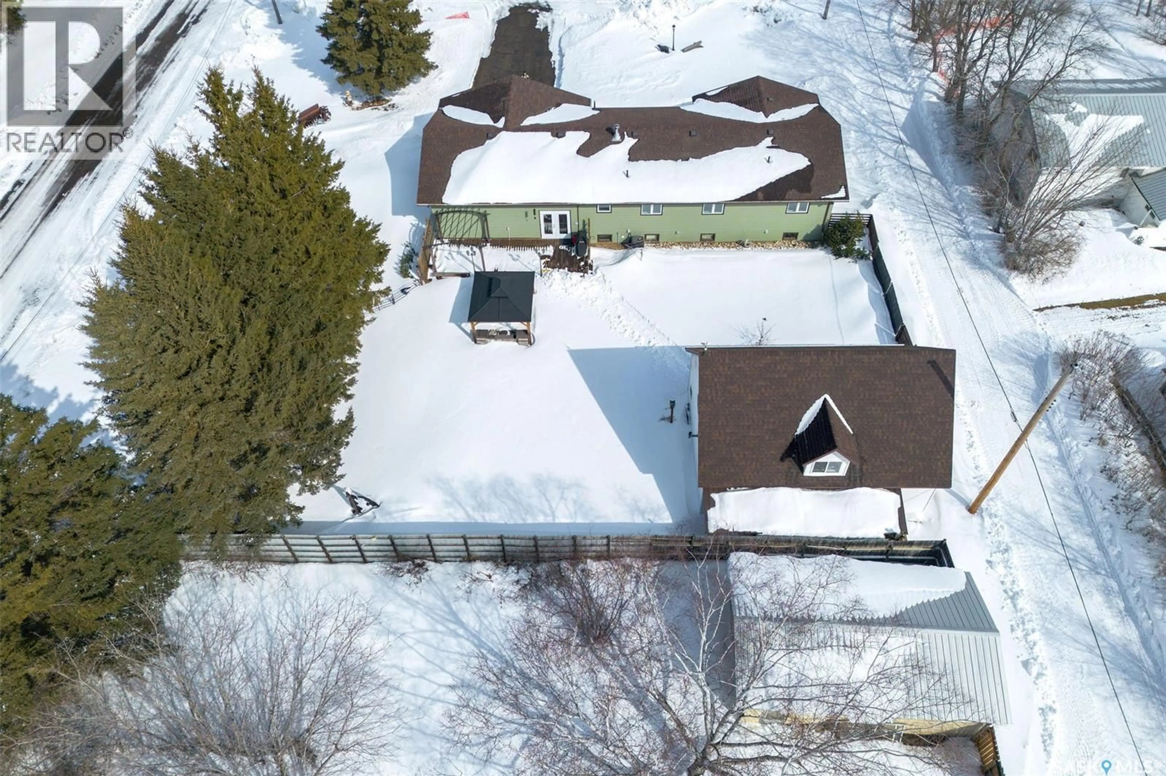 A pic from outside/outdoor area/front of a property/back of a property/a pic from drone, street for 321 2ND STREET, Spalding Saskatchewan S0K4C0