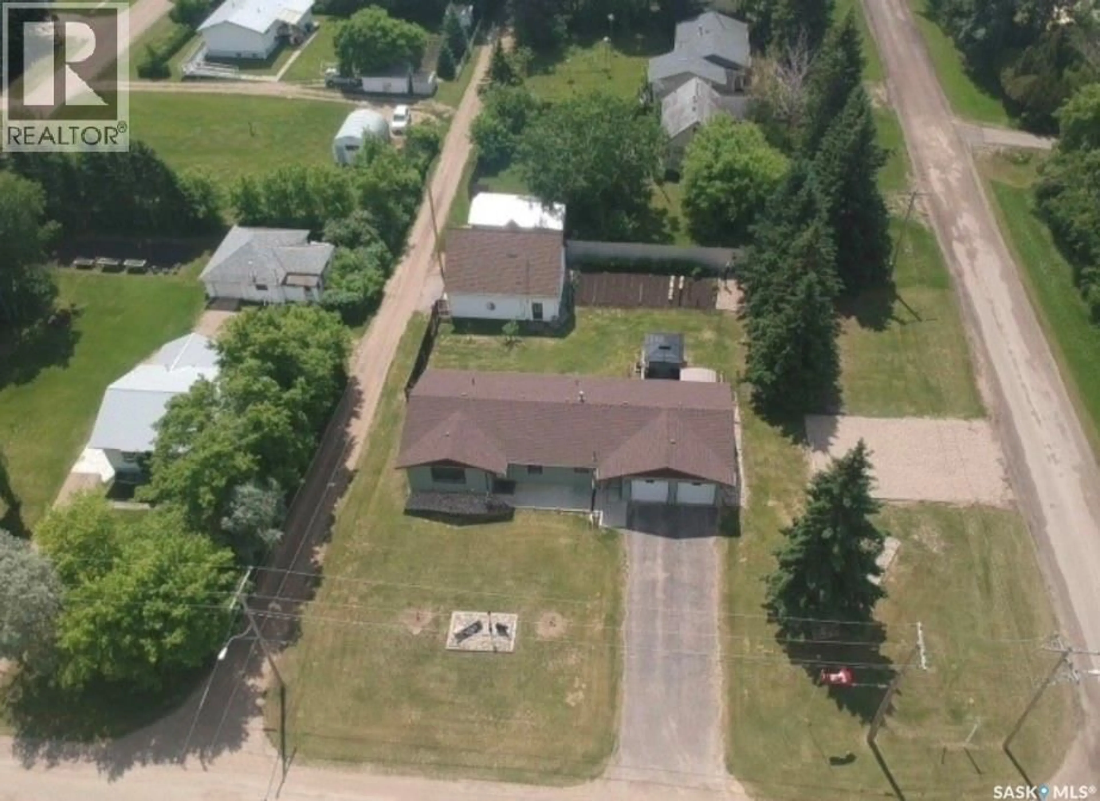 A pic from outside/outdoor area/front of a property/back of a property/a pic from drone, street for 321 2ND STREET, Spalding Saskatchewan S0K4C0
