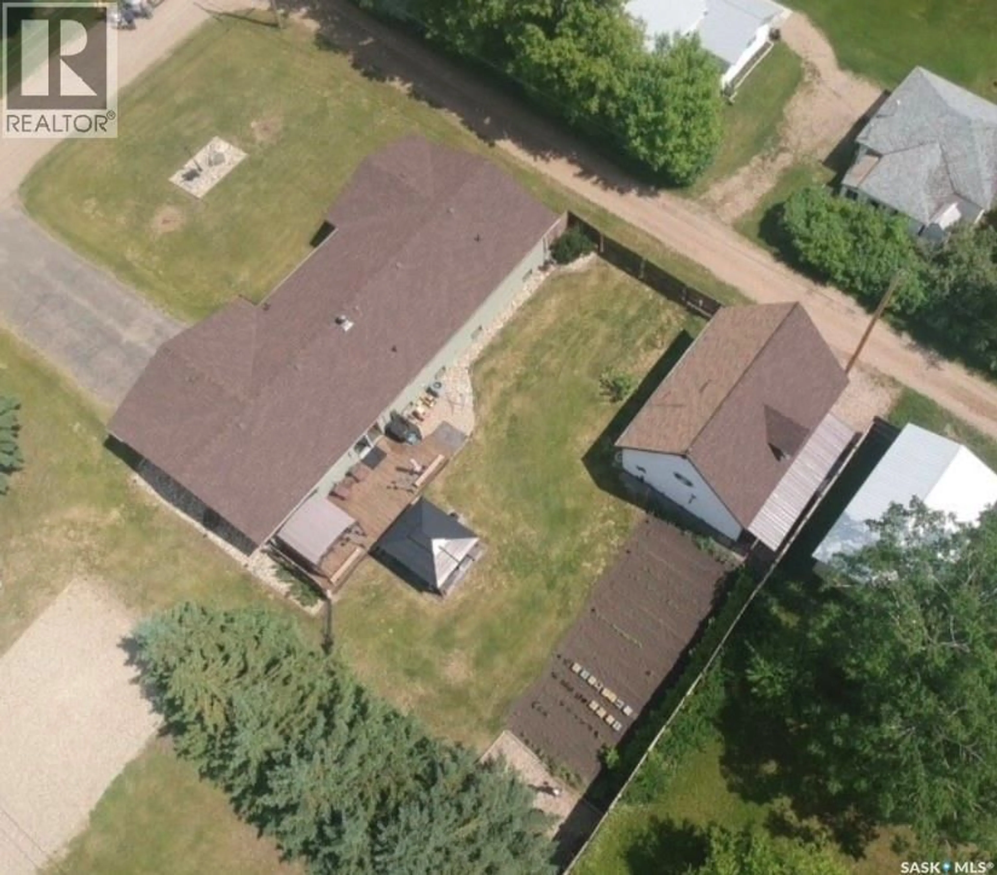 A pic from outside/outdoor area/front of a property/back of a property/a pic from drone, street for 321 2ND STREET, Spalding Saskatchewan S0K4C0