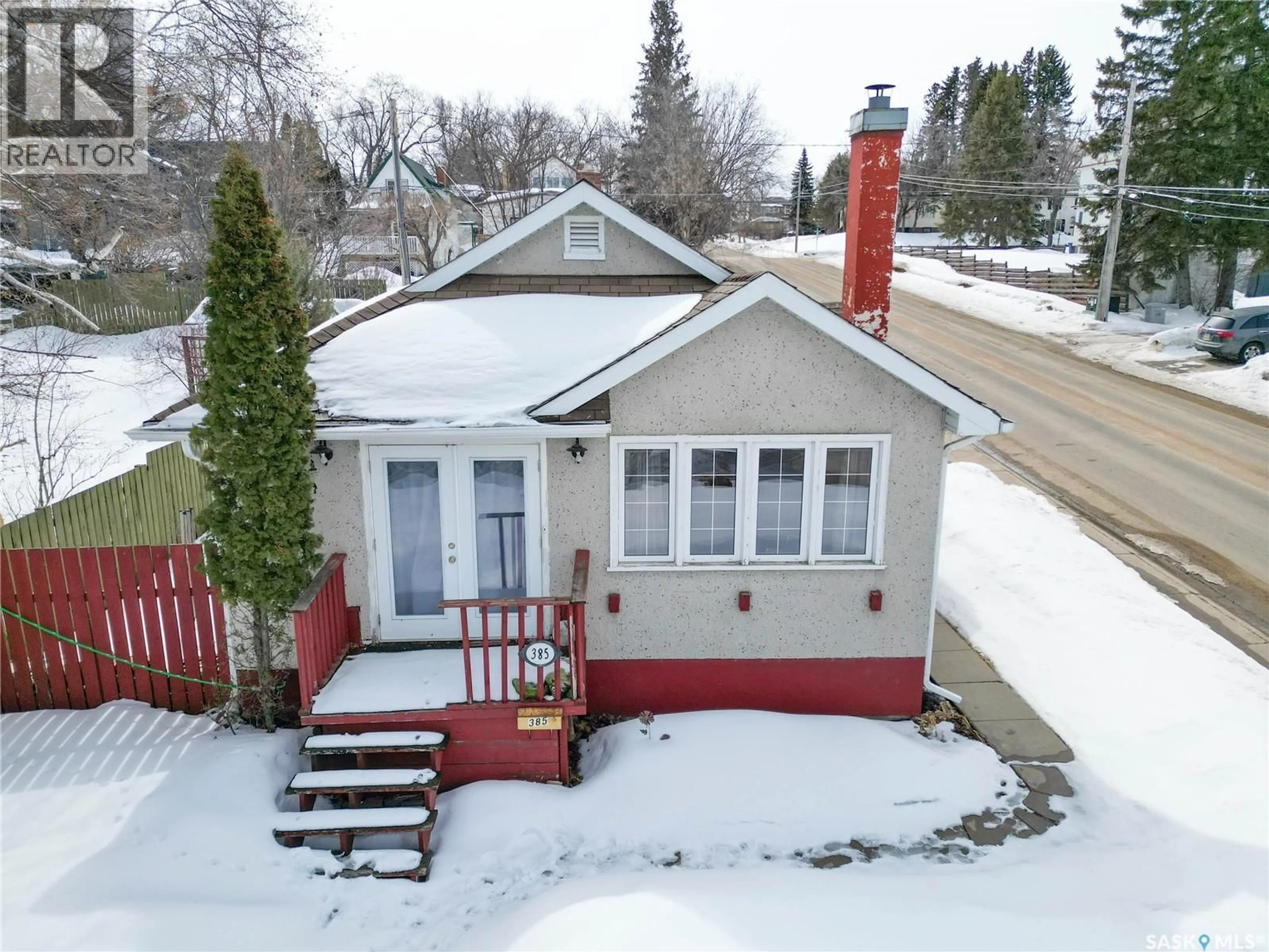 A pic from outside/outdoor area/front of a property/back of a property/a pic from drone, street for 385 19TH STREET, Prince Albert Saskatchewan S6V4C8
