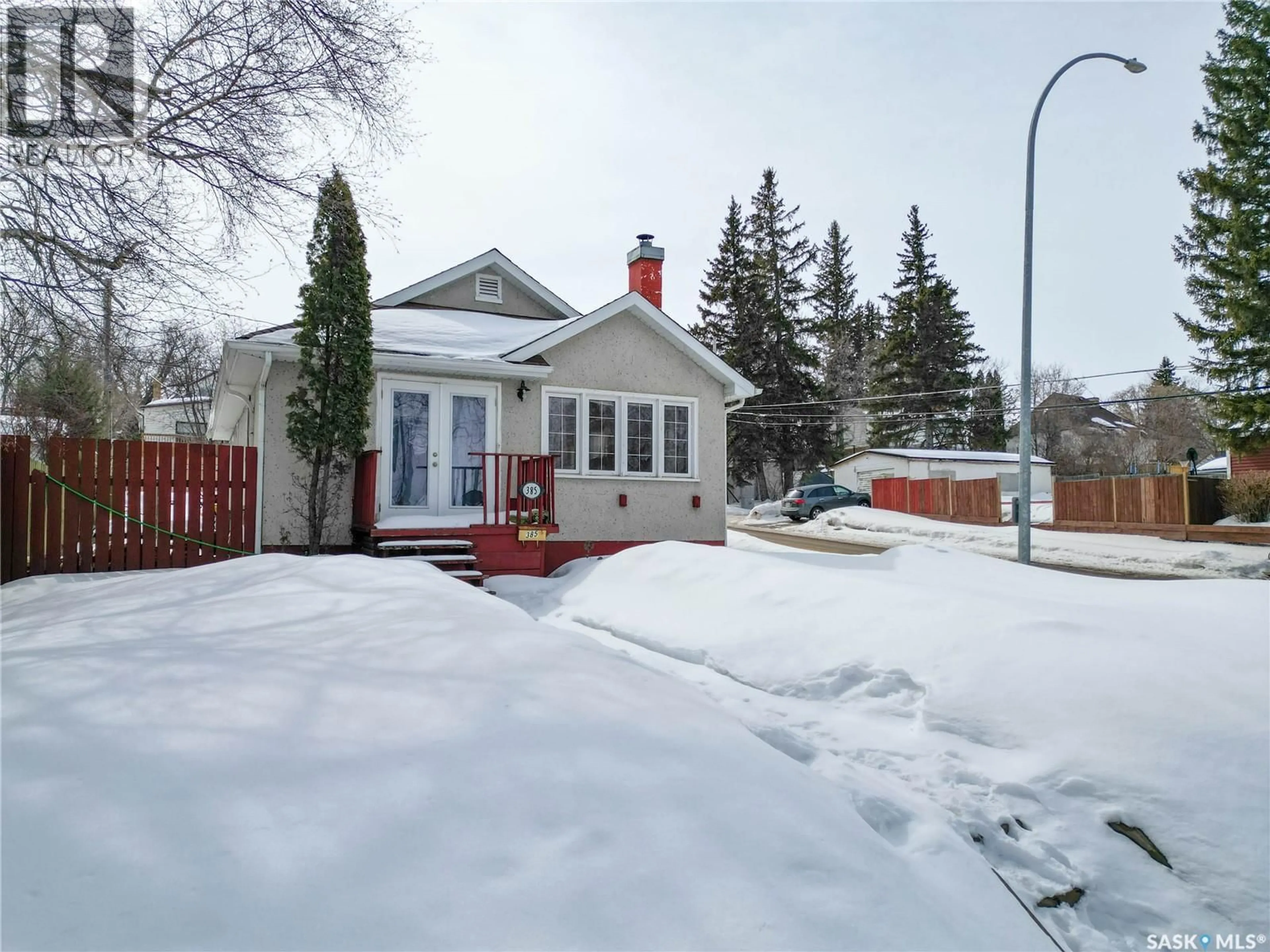 A pic from outside/outdoor area/front of a property/back of a property/a pic from drone, street for 385 19TH STREET, Prince Albert Saskatchewan S6V4C8