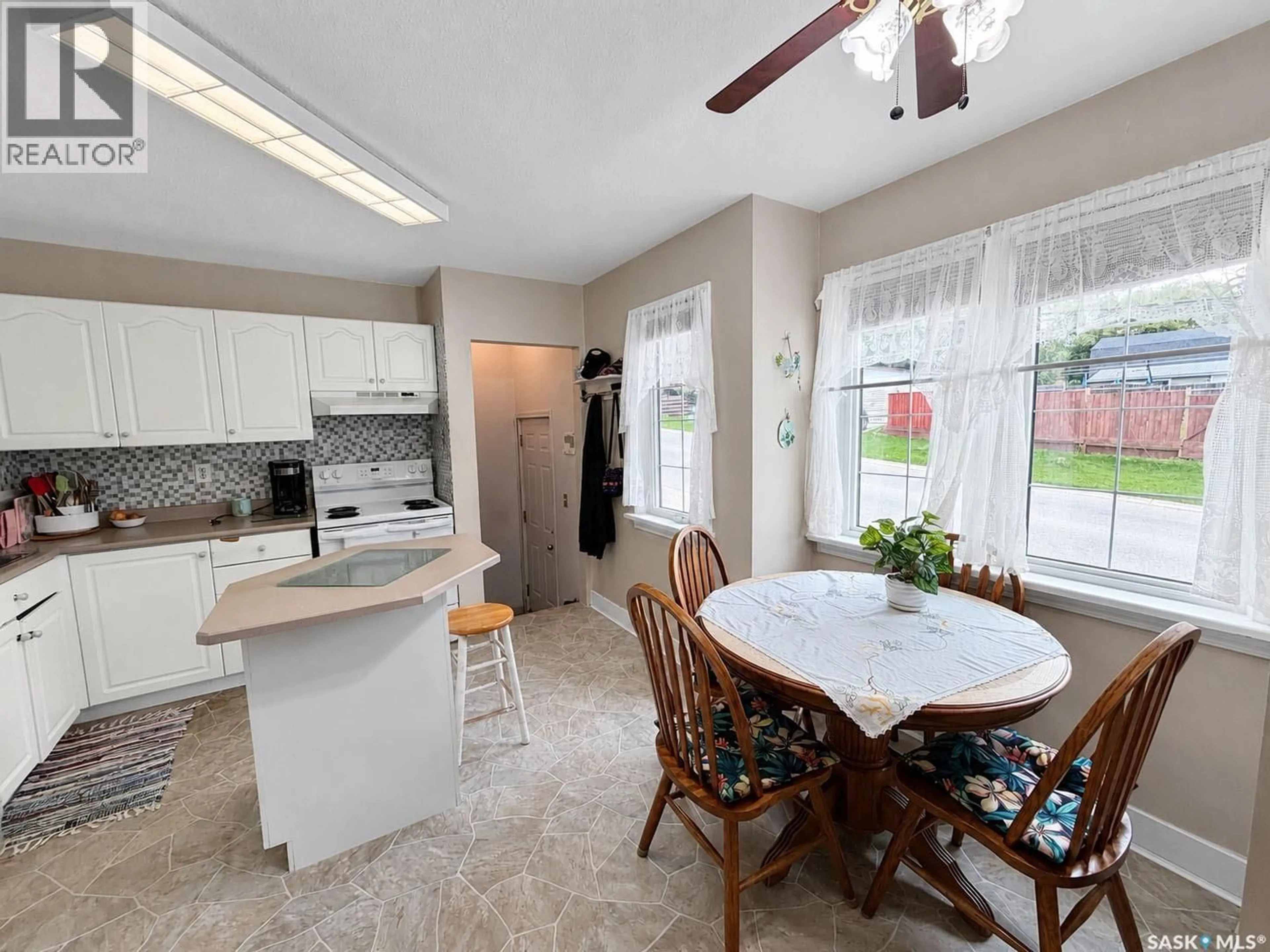 Open concept kitchen, ceramic/tile floor for 385 19TH STREET, Prince Albert Saskatchewan S6V4C8