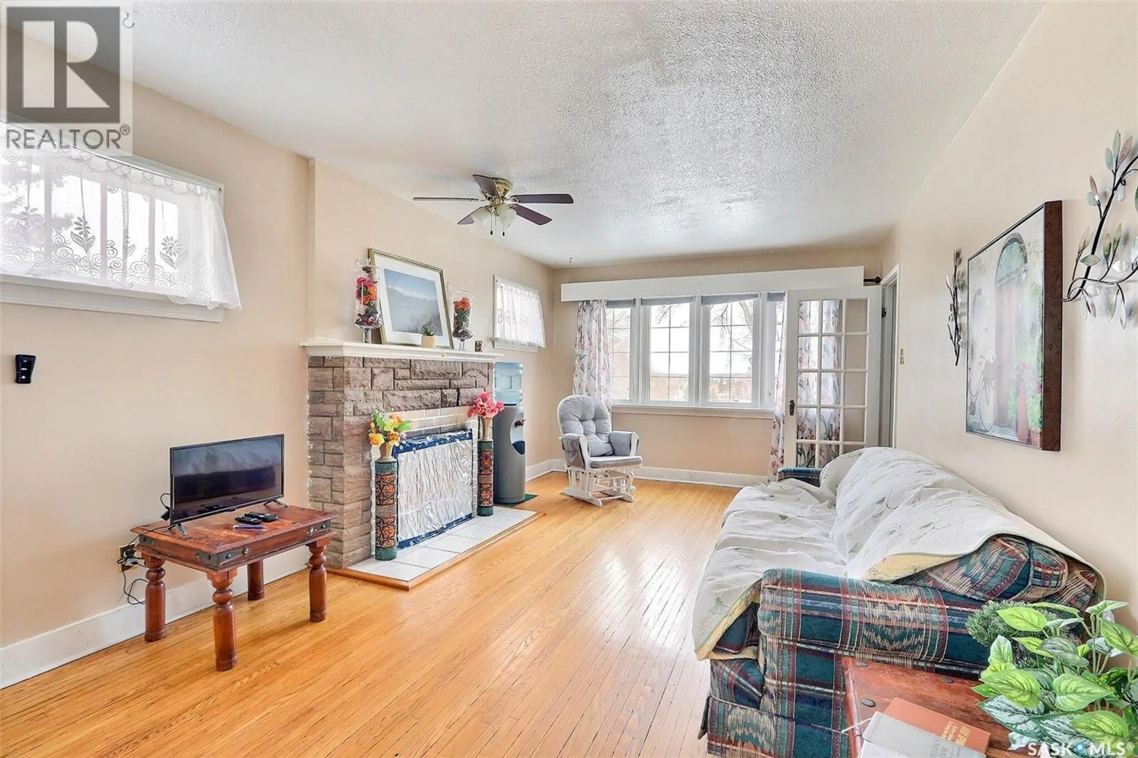 Living room with furniture, unknown for 385 19TH STREET, Prince Albert Saskatchewan S6V4C8