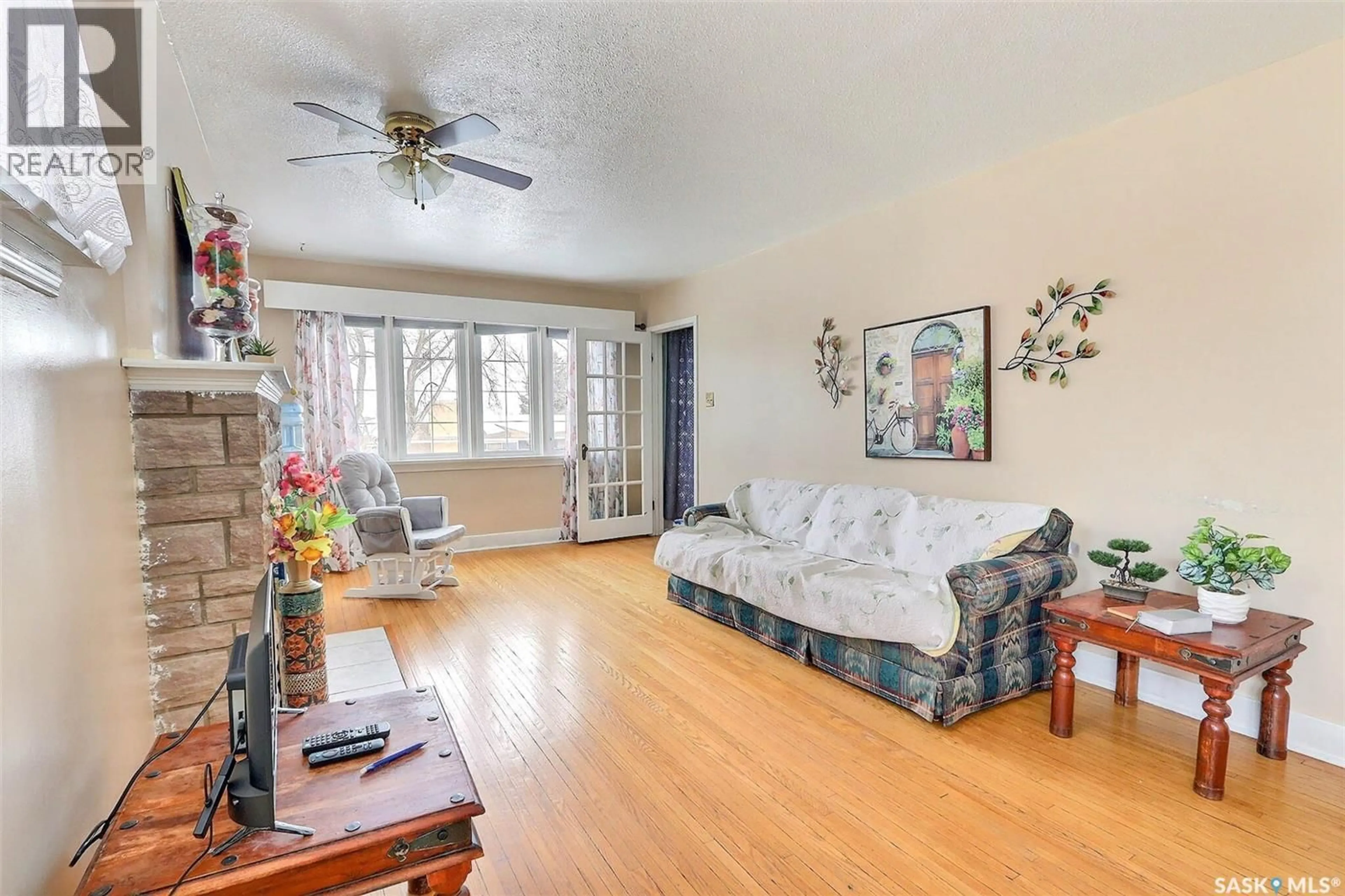 Living room with furniture, unknown for 385 19TH STREET, Prince Albert Saskatchewan S6V4C8