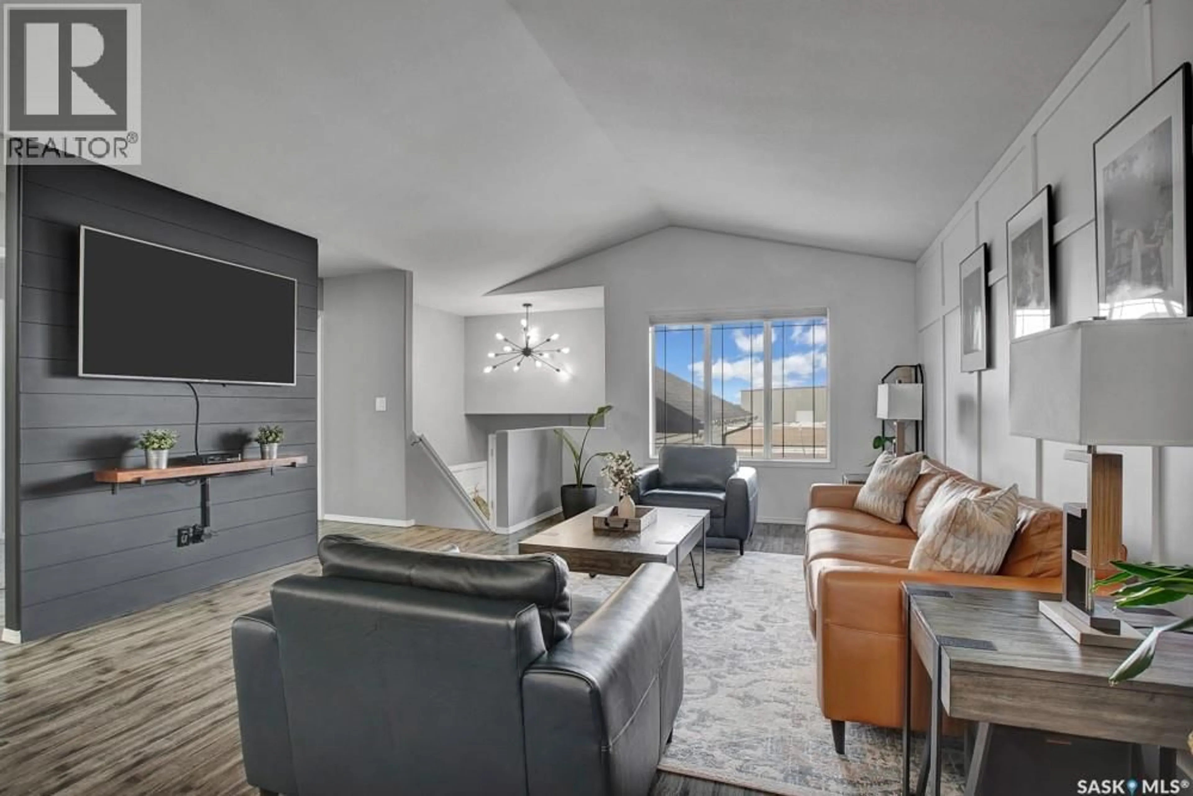 Living room with furniture, unknown for 703 GOWAN ROAD, Warman Saskatchewan S0K4S2