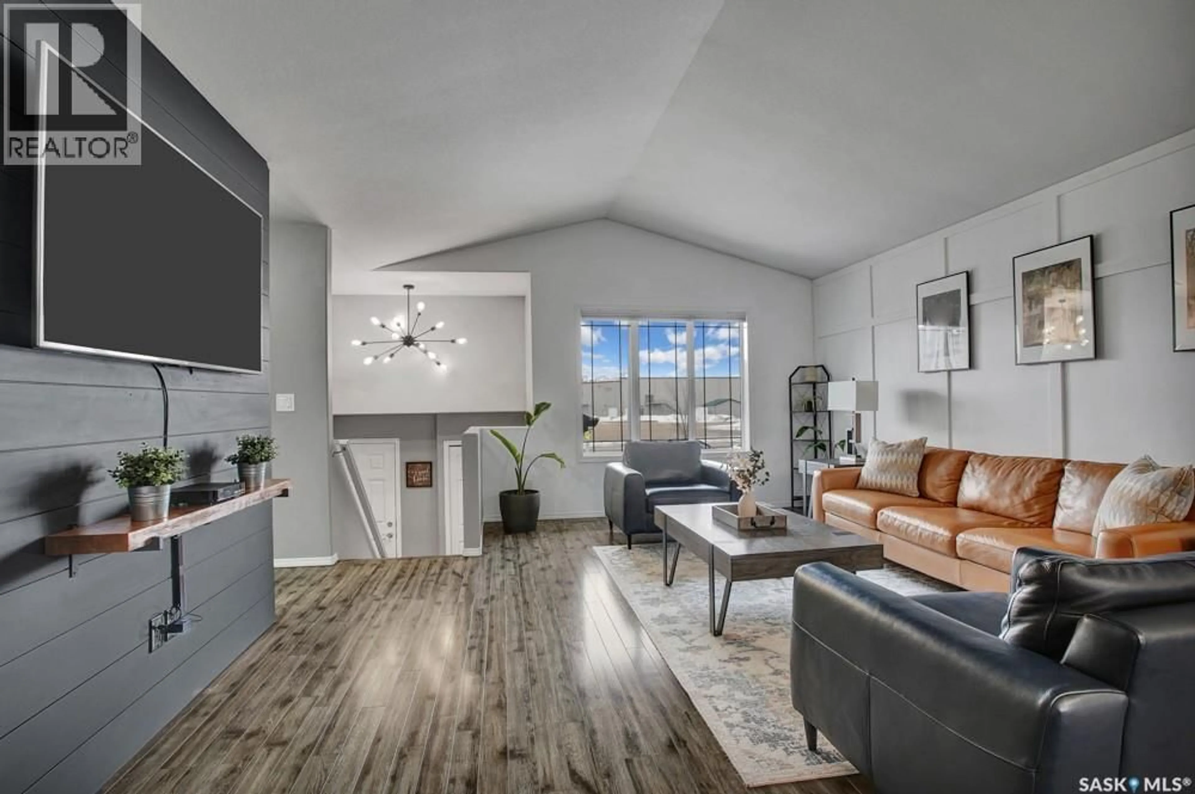 Living room with furniture, unknown for 703 GOWAN ROAD, Warman Saskatchewan S0K4S2