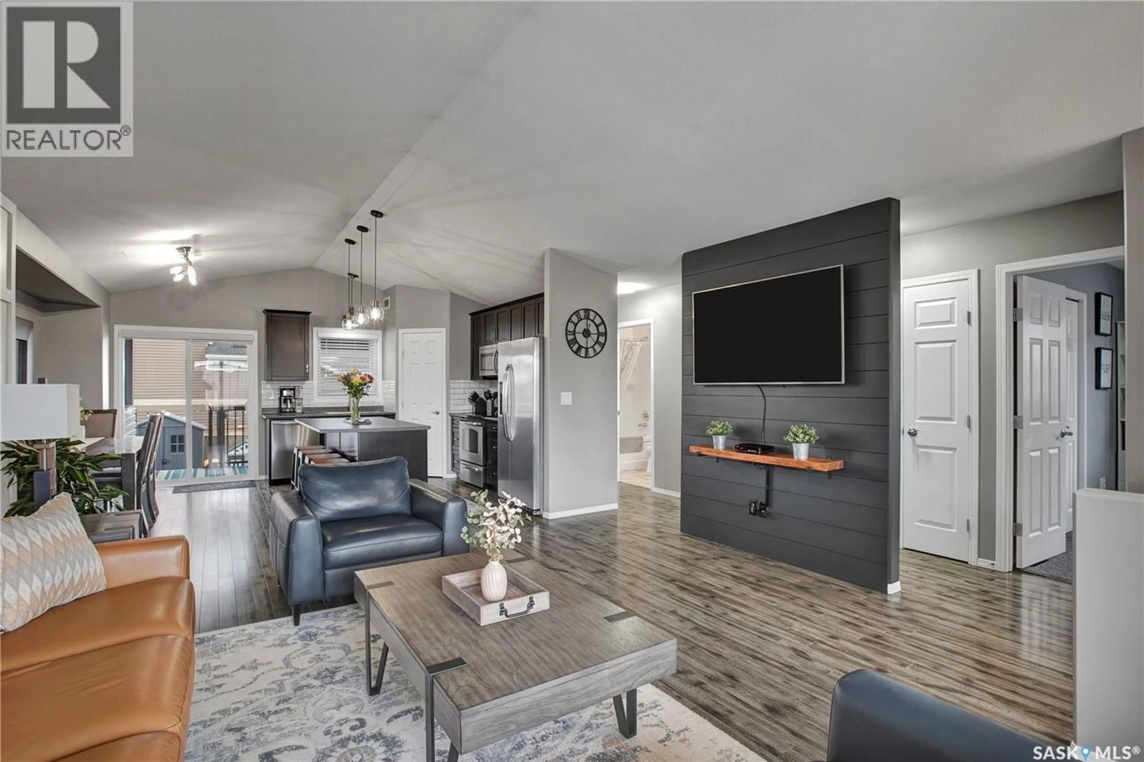 Living room with furniture, unknown for 703 GOWAN ROAD, Warman Saskatchewan S0K4S2